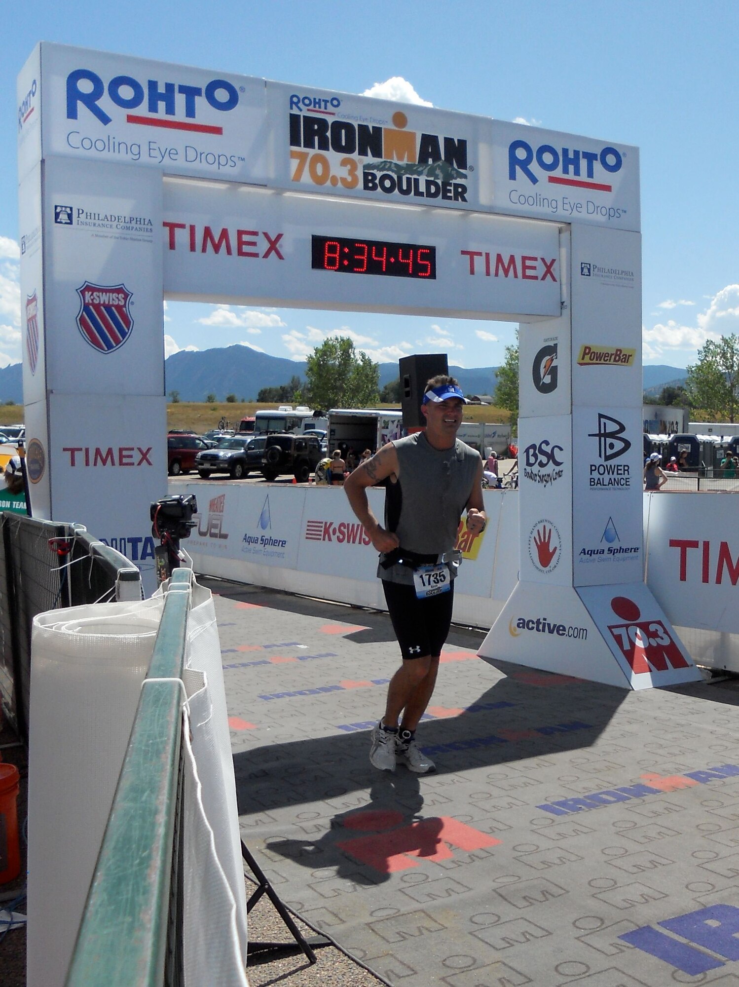 Kevin Clark of the 544th Intelligence, Surveillance and Reconnaissance Group, crosses the finish line of the 13.1 mile run, one of the three legs of the Ironman Triathlon Aug. 7 in Boulder, Colo. (Courtesy Photo)