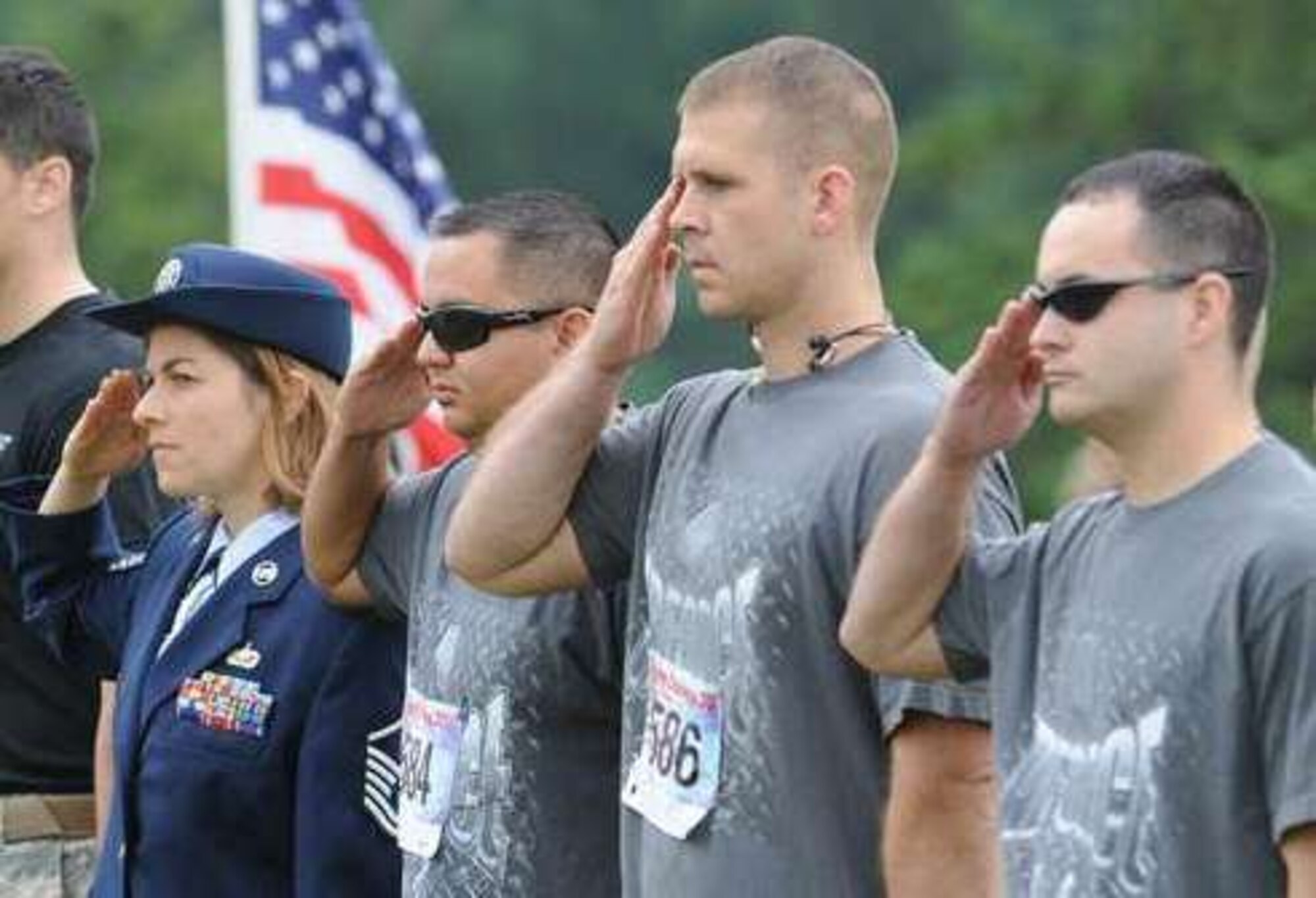 Members of the 347th Recruiting Squadron participated in the 6th Annual Pfc. Ryan Jerabek, United States Marine Corps Memorial four mile challenge Aug. 13 at Green Bay, Wisc. (l-r) Master Sgt. Letitia Sonnenberg, Capt. Robert Terrazas, Tech. Sgt. Dwight Branstetter and Tech. Sgt. Michael Goodman ran in the memorial challenge and handed out Air Force headbands. (U.S. Air Force photo/courtesy photo)