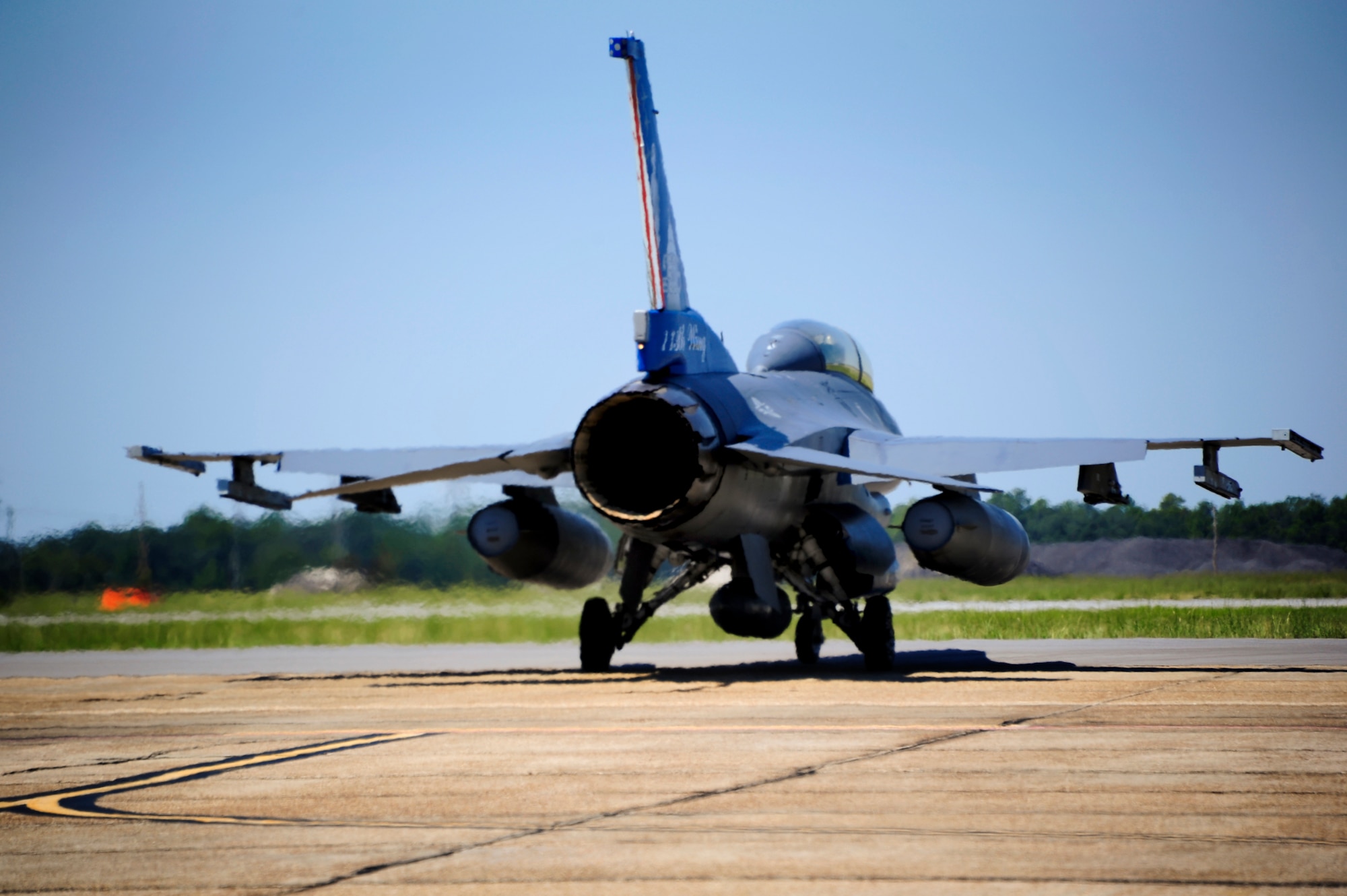 The 113th Wing flagship F-16 Fighting Falcon, from the District of Columbia Air National Guard, taxis out toward the runway at Eglin Air Force Base, Fla., returning home to Washington, Aug. 29.  The F-16s arrived here Aug. 26 as an evacuation measure from the impending Hurricane Irene.  (U.S. Air Force photo/Staff Sgt. Joely Santiago)