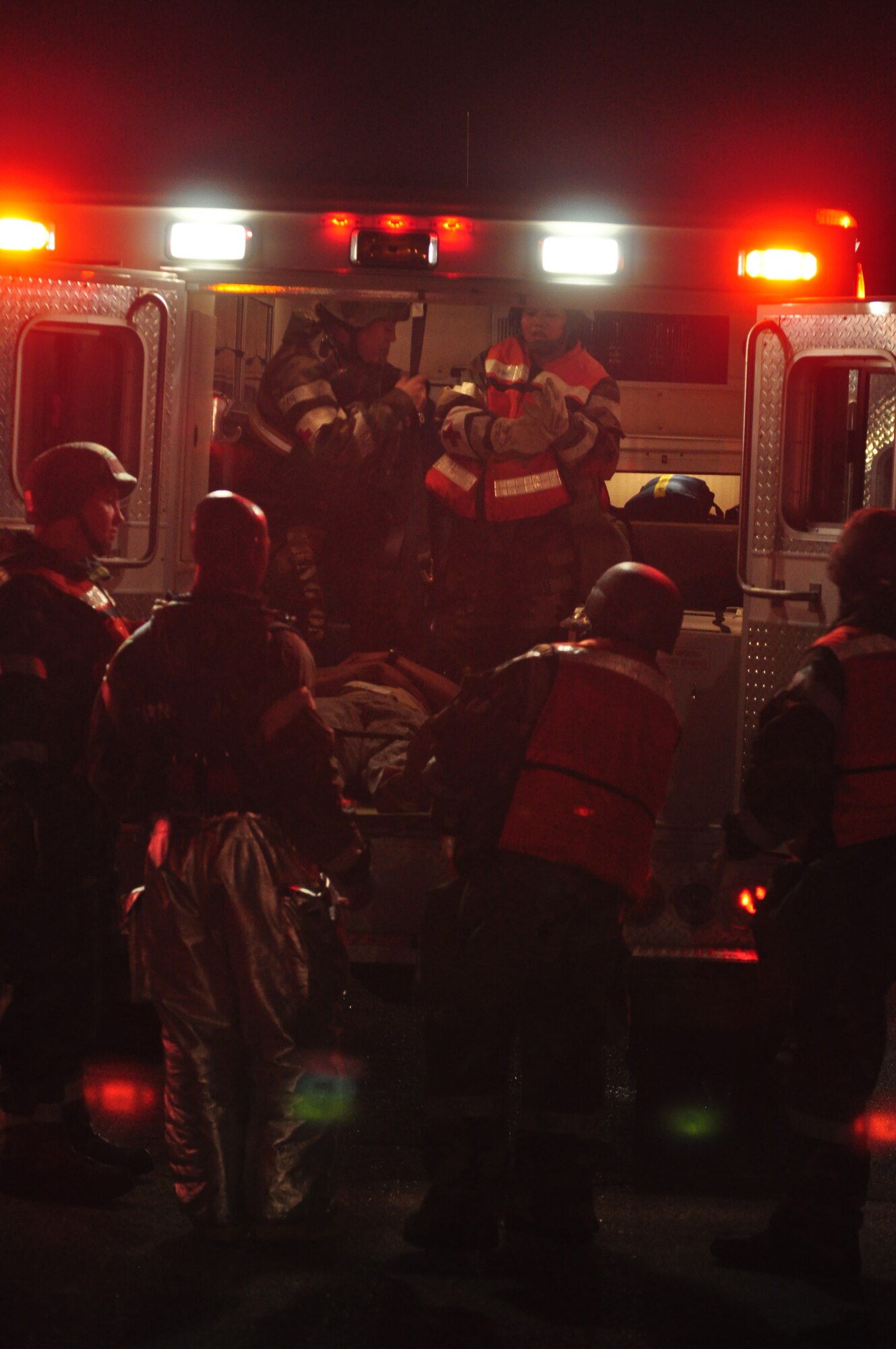 Osan’s fire department and base medics respond to a simulated C-130 Hercules aircraft crash Aug. 30, 2011, during Operational Readiness Exercise Beverley-Midnight 11-04. Exercises, such as this, test Osan’s ability to survive and operate during war-time constraints. (U.S. Air Force photos/Tech. Sgt. Chad Thompson)