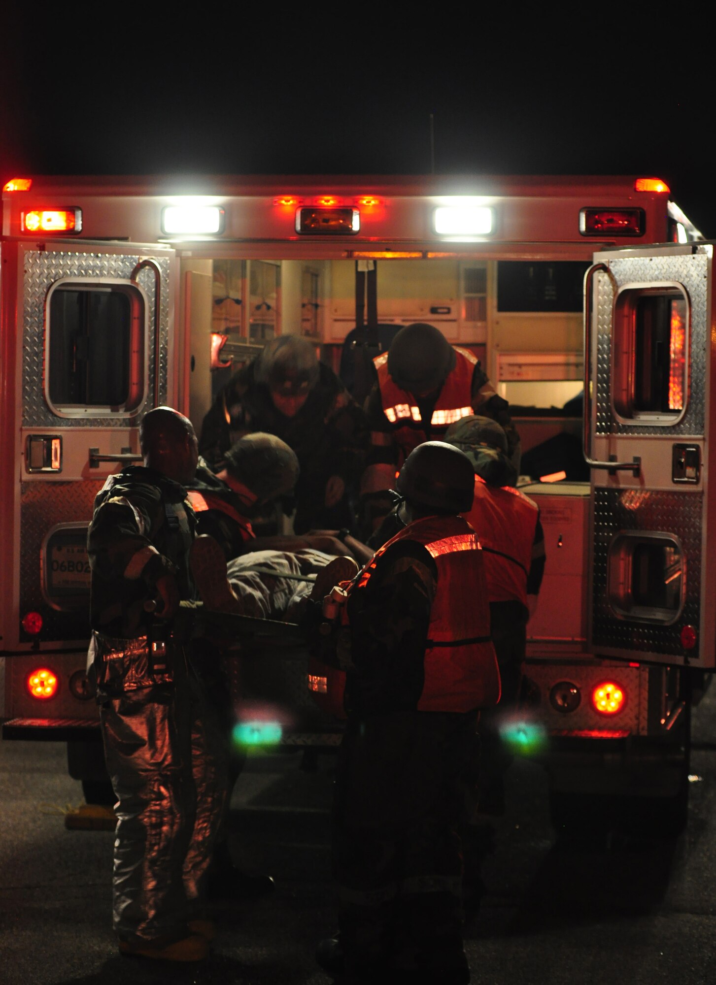 Osan’s fire department and base medics respond to a simulated C-130 Hercules aircraft crash Aug. 30, 2011, during Operational Readiness Exercise Beverley-Midnight 11-04. Exercises, such as this, test Osan’s ability to survive and operate during war-time constraints. (U.S. Air Force photos/Tech. Sgt. Chad Thompson)