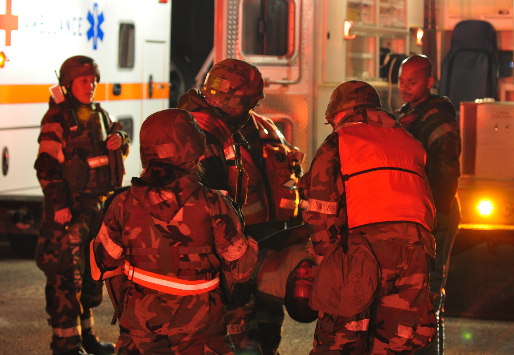 Osan’s fire department and base medics respond to a simulated C-130 Hercules aircraft crash Aug. 30, 2011, during Operational Readiness Exercise Beverley-Midnight 11-04. Exercises, such as this, test Osan’s ability to survive and operate during war-time constraints. (U.S. Air Force photos/Tech. Sgt. Chad Thompson)