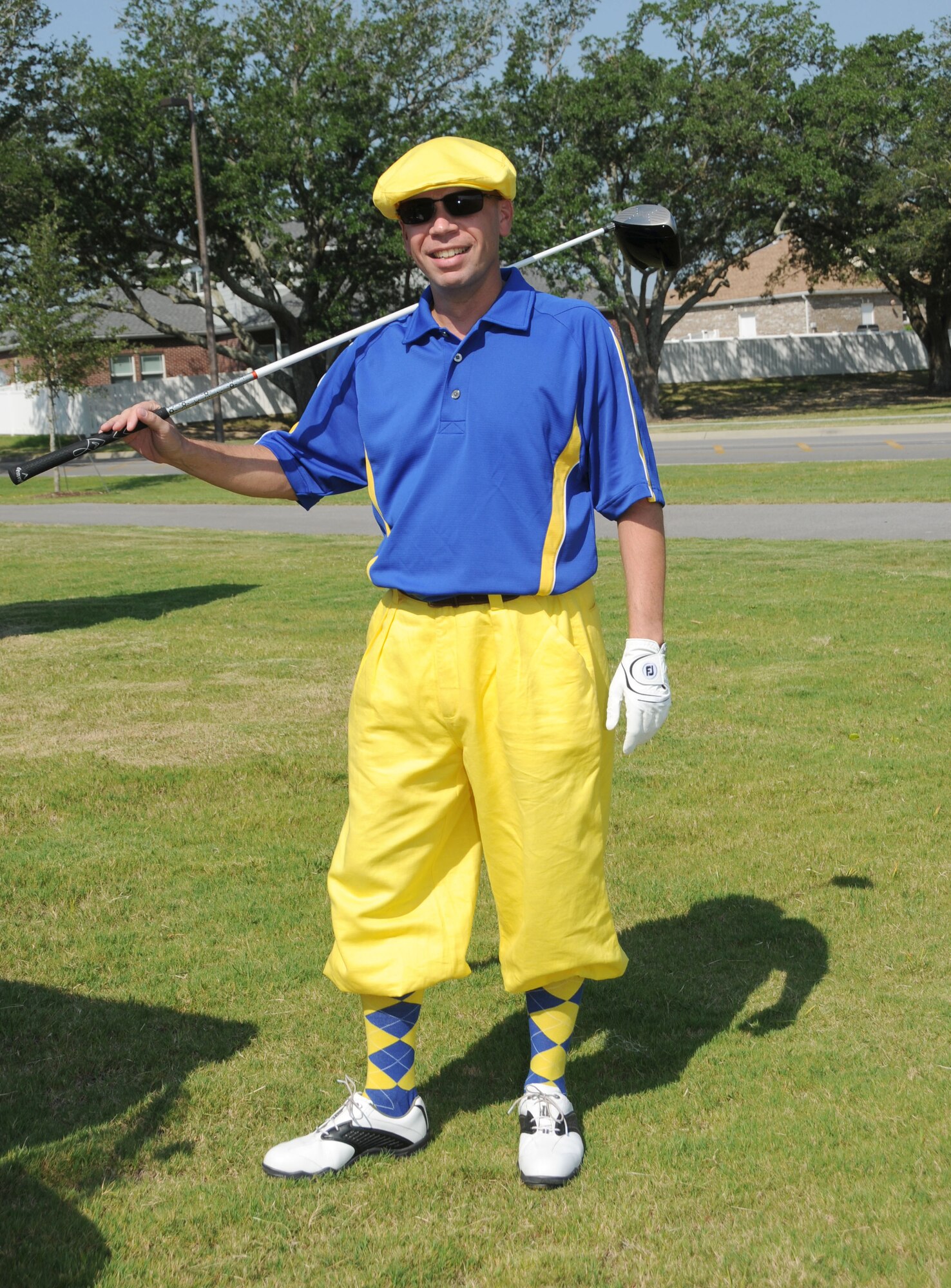 Col. Glen Downing, 81st Training Wing vice commander, sports vintage golf apparel during the Keesler 70th Birthday Celebration Golf Tournament Aug. 27.  (U.S. Air Force photo by Kemberly Groue)