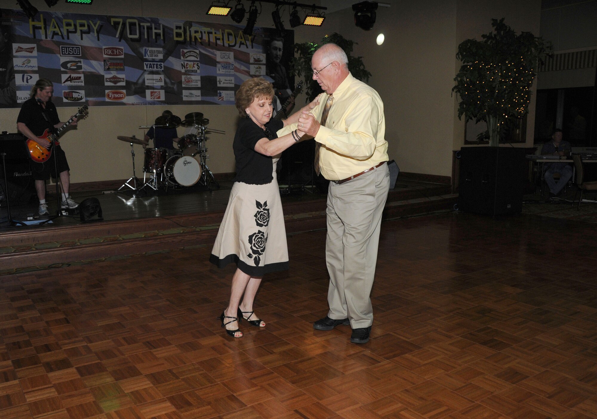 Jamie and Bob Perronne of Gulfport dance to "Good Golly Miss Molly" performed by the Big Bang Theory during the Keesler 70th Birthday Celebration at Bay Breeze Event Center Aug. 27.  Jamie is an associate member of Board of Directors for Keesler Federal Credit Union.  (U.S. Air Force photo by Kemberly Groue)