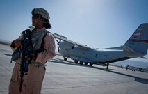 Senior Airman Nyeisha Harrington, 451st Expeditionary Security Forces Squadron member, watches over the flightline during her stop at Tirin Kot, Afghanistan, Aug. 19, 2011. Security Forces Airmen like Harrington are in charge of protecting and providing security for thousands of deployed servicemembers and millions of dollars worth of deployed military assets and equipment. Senior Airman Harrington is deployed from Seymour Johnson Air Force Base, N.C. (U.S. Air Force photo by Senior Airman Corey Hook)

 
