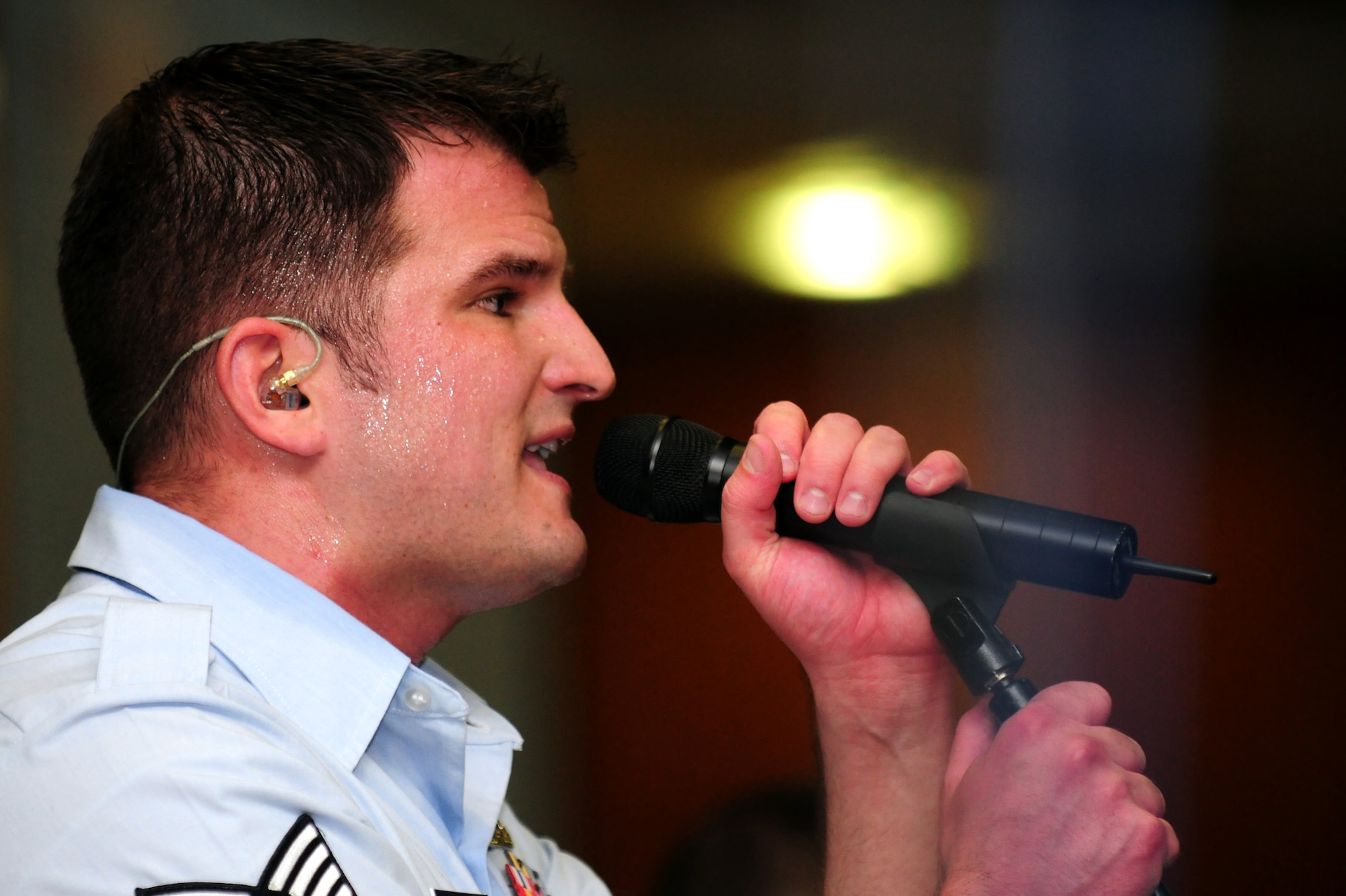SPANGDAHLEM AIR BASE, Germany – Staff Sgt. Craig Bowman, U.S. Air Forces in Europe Band vocalist, sings during a performance at Club Eifel during Spangdahlem’s Diversity Day 2011 Aug. 25. Diversity Day showcased numerous attractions and booths that displayed cultural and ethnic diversity among Air Force service members and their families. (U.S. Air Force photo/Airman 1st Class Matthew B. Fredericks)
