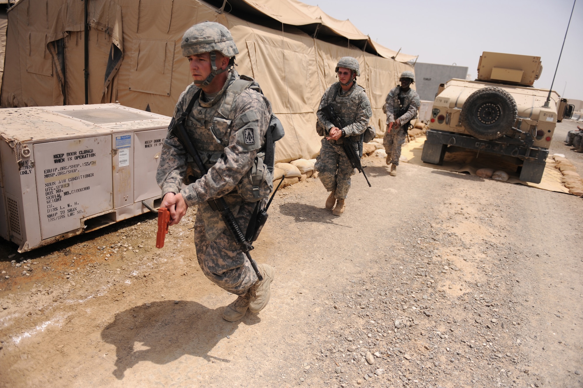 Members of the quick reaction force from the U.S. Army's 3rd Battalion, 4th Air Defense Artillery Regiment react to a simulated active shooter during an exercise on the Army's Patriot missile site Aug. 24, 2011 at an air base in Southwest Asia. The exercise was the first of several unit-level active shooter exercises to be conducted by the 380th Expeditionary Security Forces Squadron. (U.S. Air Force photo/Master Sgt. Chance Babin)