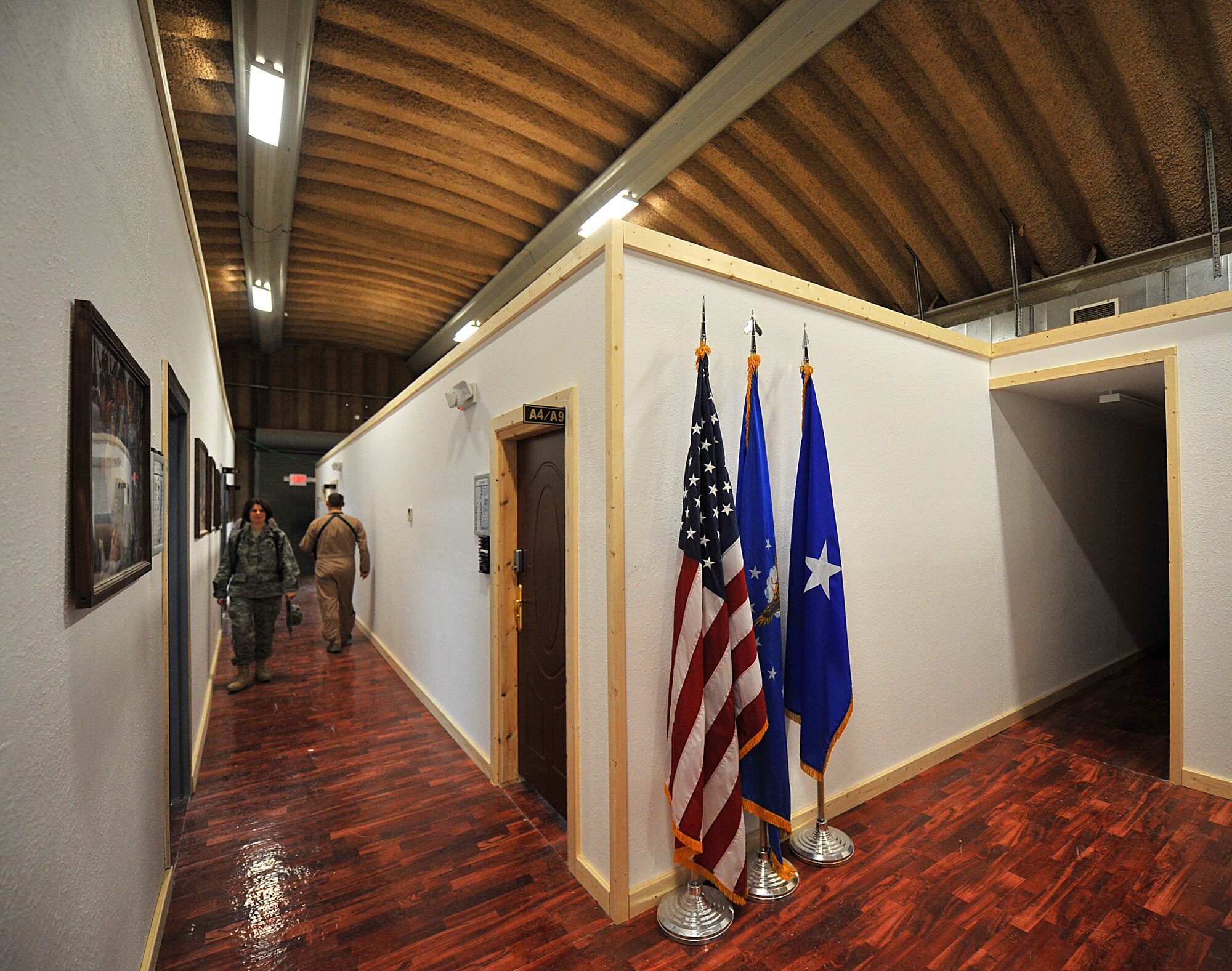 Airmen wasted no time becoming fully operational in the newly renovated k-span serving as the 321st Air Expeditionary Wing and Iraqi Training and Advisory-Air headquarters Aug. 28, 2011. To meet the U.S. military end of year drawdown requirement in Iraq, the former 321st AEW headquarters was scheduled to be turned over to the Government of Iraq in August. (U.S. Air Force photo/Tech. Sgt. Josef Cole)