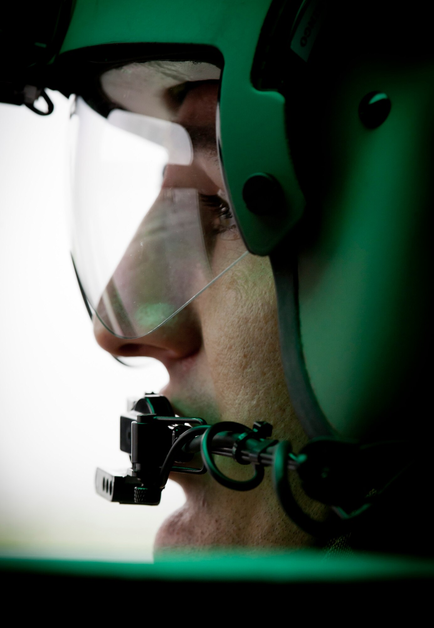 YOKOTA AIR BASE, Japan -- Capt. Nicholas Ringo, 459th Airlift Squadron co-pilot, looks out the window of a UH-1N Iroquois while waiting for the signal to fly during the Japanese-American Friendship Festival Aug. 21, 2011, at Yokota Air Base, Japan. (U.S. Air Force photo/Staff Sgt. Samuel Morse)