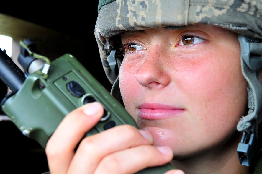 Airman 1st Class Leslie Gerbes, 51st Security Forces Squadron, calls in a radio check while securing an entry control point Aug. 30, 2011, during exercise Beverly-Midnight 11-04. Exercises, such as this, sharpen Osan's ability to survive and operate during combat. (U.S. Air Force photo/Senior Airman Adam Grant)  