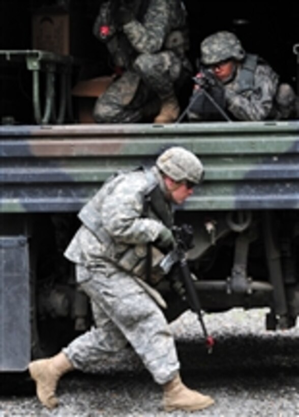 U.S. Army soldiers with the 56th Engineer Company, 6th Engineer Battalion hone their skills during tactical convoy operations training on Bulldog Trail at Joint Base Elmendorf-Richardson, Alaska, on Aug. 23, 2011.  The soldiers are training in tactics, techniques and procedures to prepare them for future deployments.  