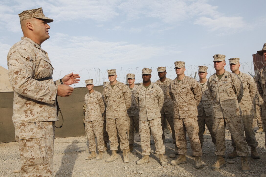 Lt. Col. Thomas Bajus, the outgoing commanding officer of Marine Air Control Group 28, speaks to his Marines prior to relinquishing command to Lt. Col. John R. Siary for the second half of the group’s yearlong deployment to Camp Leatherneck, Afghanistan, Aug. 31. “I want to congratulate the first half of Marines on the outstanding job they did out here,” said Bajus. “I know that this next group of Marines will take it to the next level.”