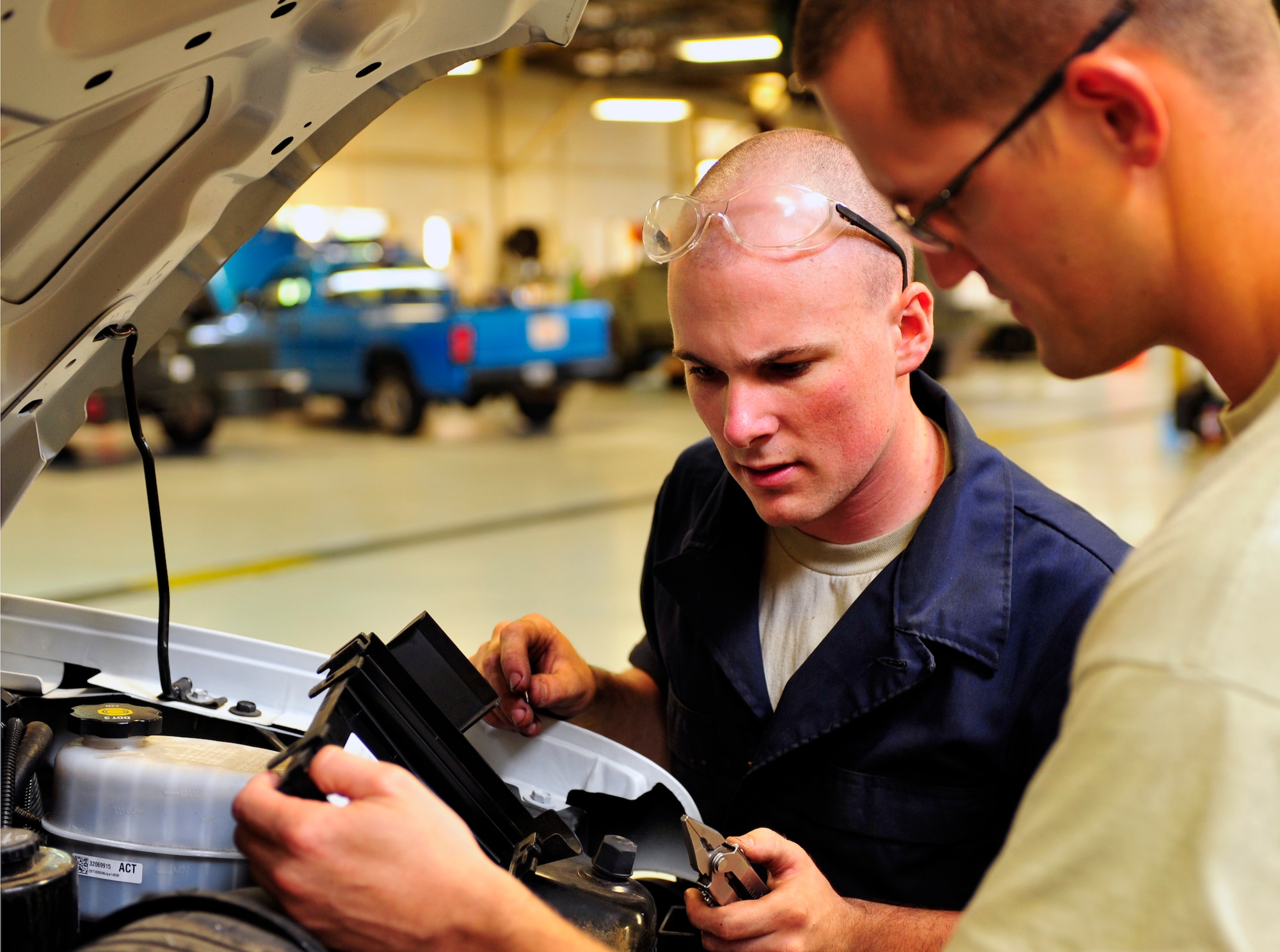 U.S. Air Force Airman 1st Class Donald Lord, 20th Logistics Readiness Squadron vehicle and equipment maintenance apprentice, inspects a vehicle to find out what is wrong with it at Shaw Air Force Base, S.C., Aug. 31, 2011. Lord is the Warrior of the Week for the week of August 29 through September 2. (U.S. Air Force photo/Airman 1st Class Daniel Phelps)(Released) 