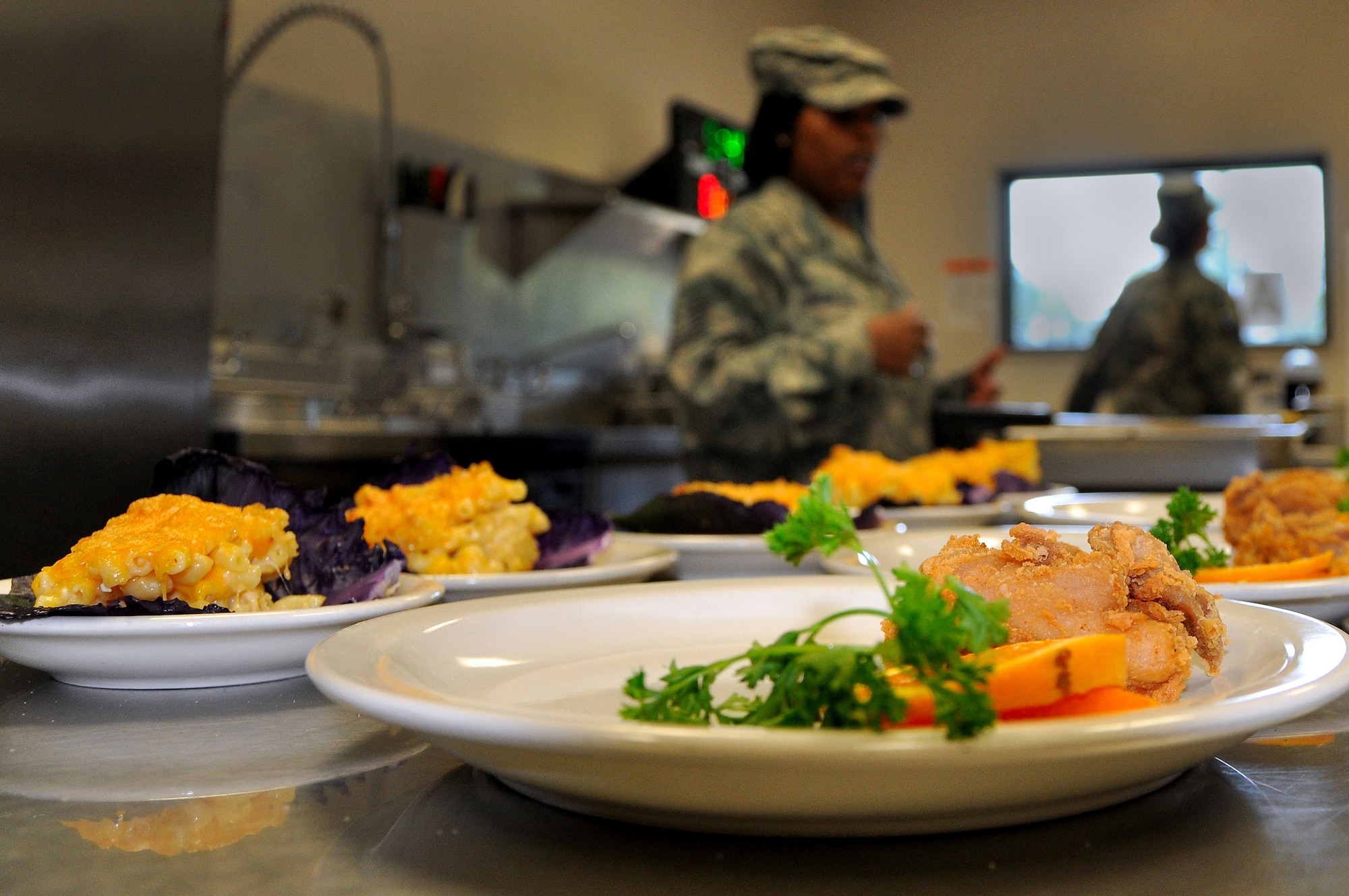 Plated food waits judging during an Iron Chef competition at the Dining Facility, Shaw Air Force Base, S.C., Aug. 31, 2011. Four teams competed for the title of Iron Chef. The teams were tasked with the challenge to produce one entrée and one appetizer using what was provided in the kitchen and the surprise ingredient of red cabbage. The products were judged on the categories of taste, presentation, creativity and incorporation of the special ingredient. (U.S. Air Force photo/Senior Airman Alexandria Mosness) (Released)