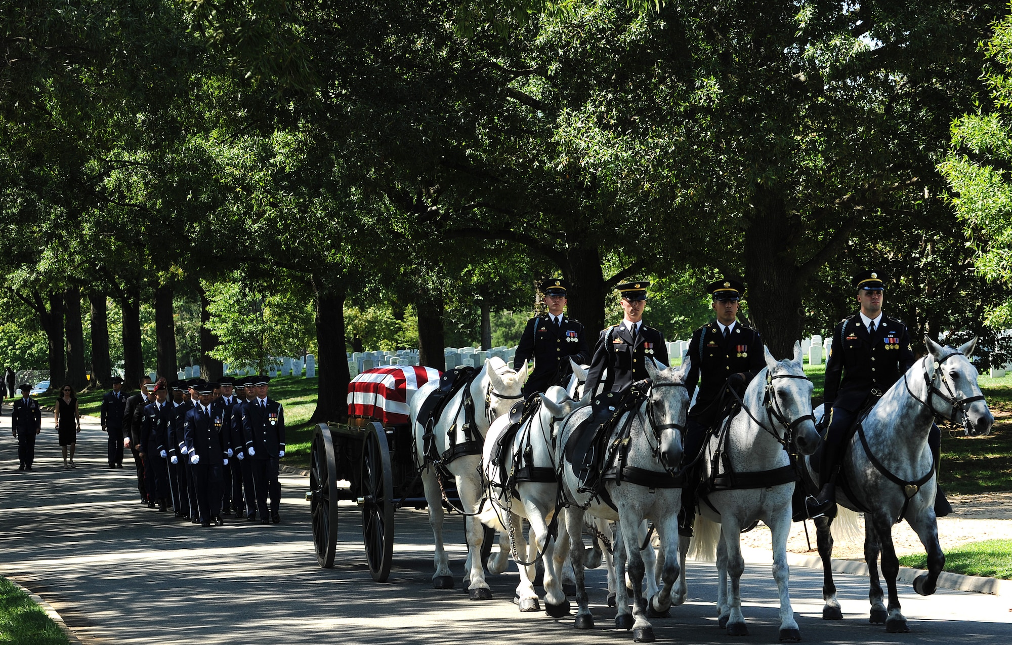 ARLINGTON, Va. -- The U.S. Army ?Old Guard? leads the procession during a funeral ceremony in honor of Tech. Sgt. John Brown at Arlington National Cemetery Aug. 30, 2011. Brown was one of 30 Americans killed in the Aug. 6 crash of a CH-47 Chinook helicopter in eastern Afghanistan. (U.S. Air Force photo/Staff Sgt. Tiffany Trojca)