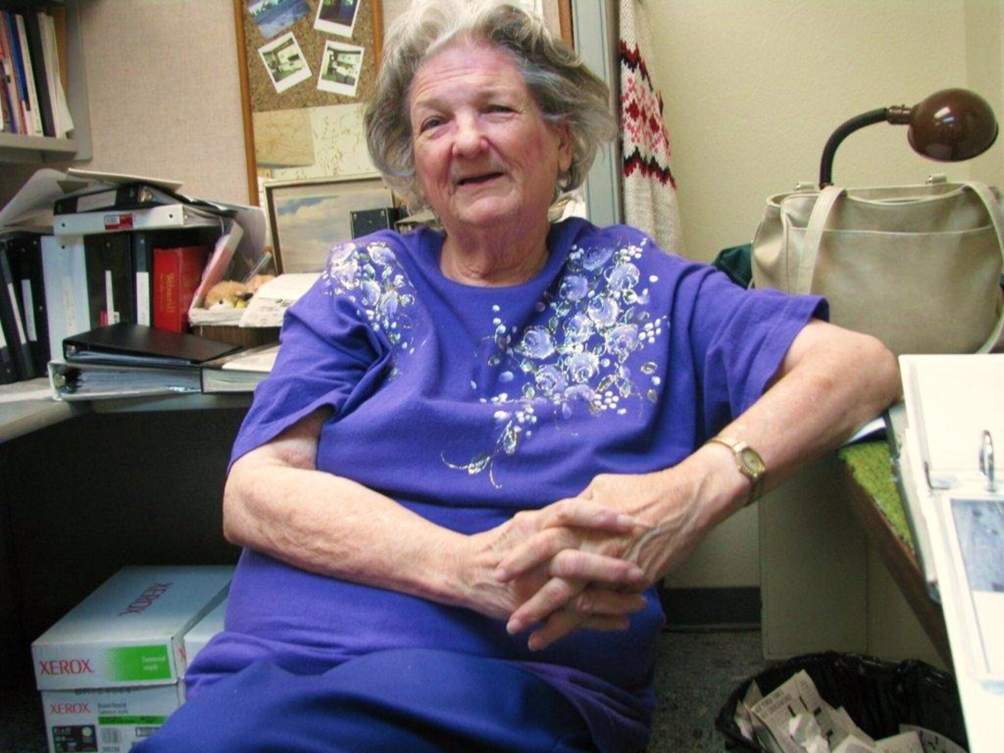 Patricia Henrich, library technician, is shown in her office in Bldg. 1600. One of Edwards' longest-serving employees, Henrich is about to celebrate her 60th anniversary of working on base. (Air Force photo by Diane Betzler)