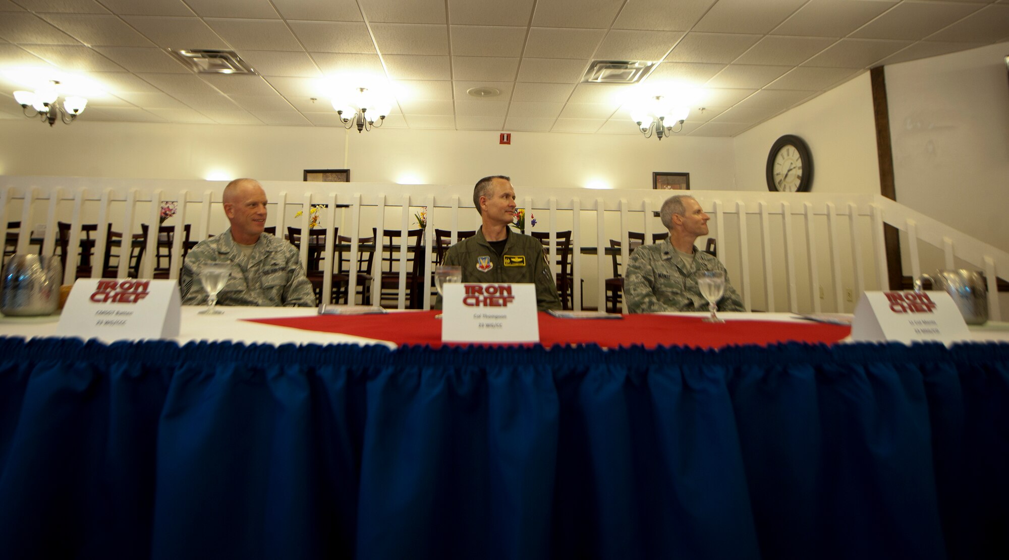 U.S. Air Force Chief Master Sgt. Frank Batten, 23rd Wing command chief, left, Col. Billy Thompson, 23rd Wing commander, center, and Lt. Col. Ryan Mantz, 23rd Mission Support Group deputy commander, serve as judges for the Iron Chef Competition at Moody Air Force Base, Ga., Aug. 30, 2011. This was the first ever Iron Chef Competition held at Moody, and the event took place at the Georgia Pines Dining Facility. (U.S. Air Force photo by Airman 1st Class Joshua Green/Released)
