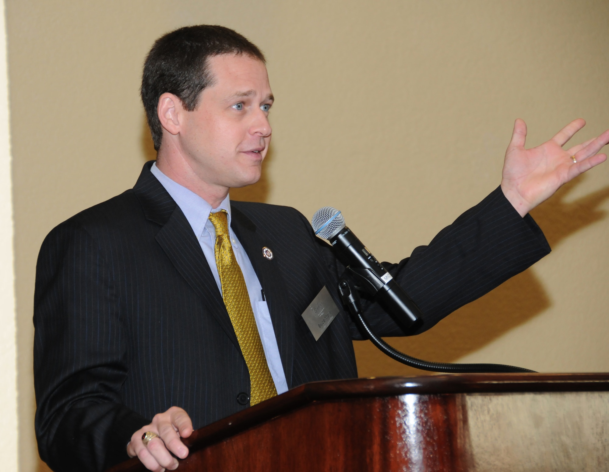 Bruce Marie, president of the Biloxi Chamber of Commerce, welcomes guests to the chamber's morning call Aug. 25.  Keesler sponsored the event at the Bay Breeze Event Center as part of the base's 70th birthday celebration.  (U.S. Air Force photo by Kemberly Groue)