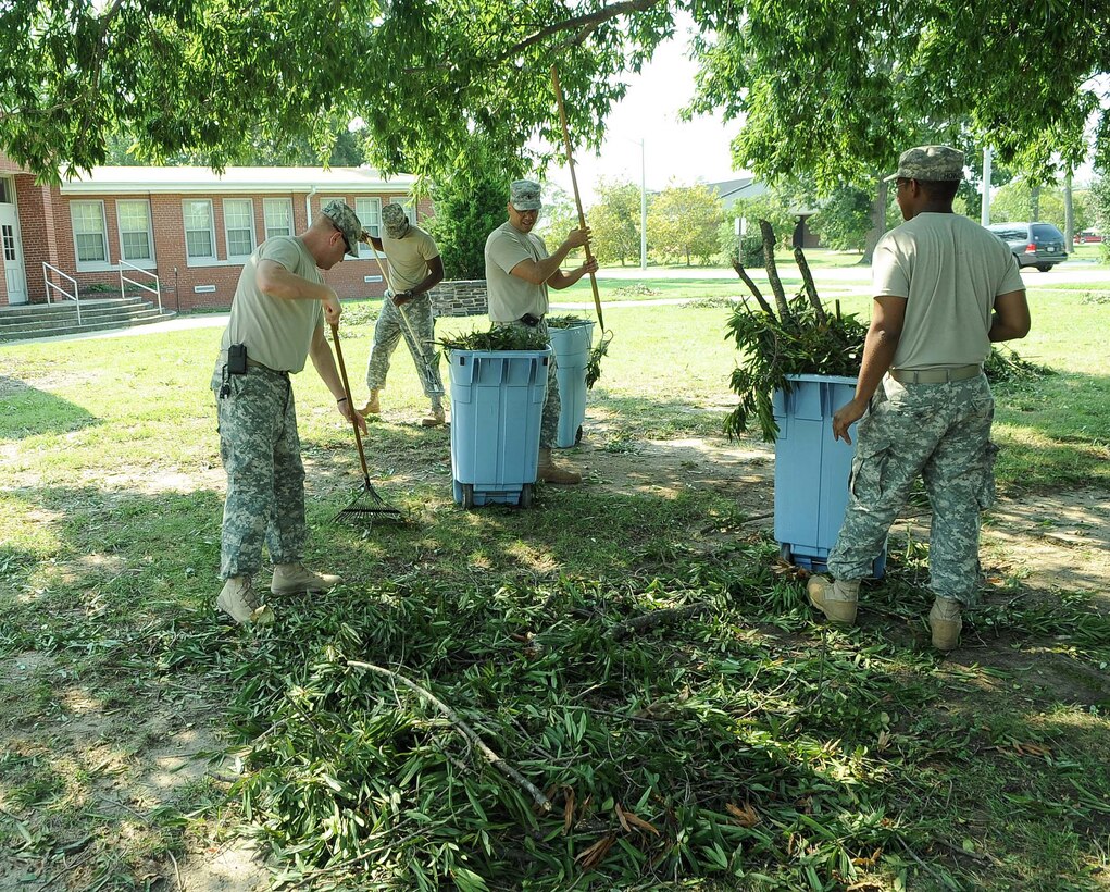 U.S. Army element Soldiers clean up the grounds of the Regimental Chapel from the damage caused by Hurricane Irene at Fort Eustis, Va., Aug 29, 2011. Ft. Eustis received minimal damage from the category one hurricane. (U.S. Air Force photo by Staff Sgt. Antoinette Gibson/Released)
