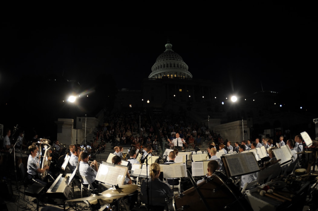 International guest conductor from Denmark, Captain Martin Åkerwall, conducts the U.S. Air Force Concert Band at the U.S. Capitol on August 16. Captain Åkerwall is the conductor of the Band of the Royal Danish Life Guards. (U.S. Air Force photo by Staff Sgt. Raymond Mills)
