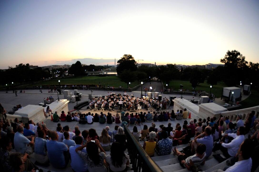 International guest conductor from Denmark, Captain Martin Åkerwall, conducts the U.S. Air Force Concert Band at the U.S. Capitol on August 16. Captain Åkerwall is the conductor of the Band of the Royal Danish Life Guards. (U.S. Air Force photo by Staff Sgt. Raymond Mills)
