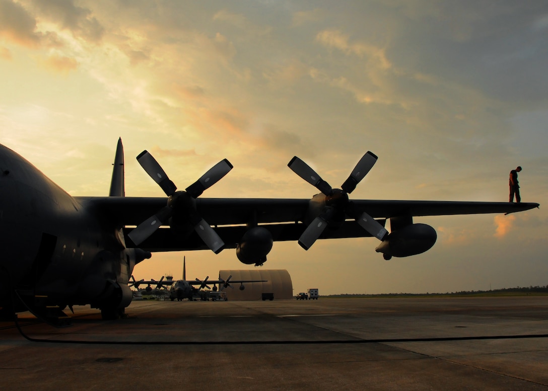 Staff Sgt. Cris Hunter, a flight engineer for 711th Special Operations Squadron, checks for malfunctions on the wing of a MC-130E Talon I on Duke Field, Fla. The flight engineer monitors the aircraft systems and calculates performance capabilities of the aircraft. The 711th SOS, part of the 919th Special Operations Wing, conducts flight training missions five days a week to maintain currency on all of their readiness requirements. (U.S. Air Force photo/Tech. Sgt. Cheryl Foster)