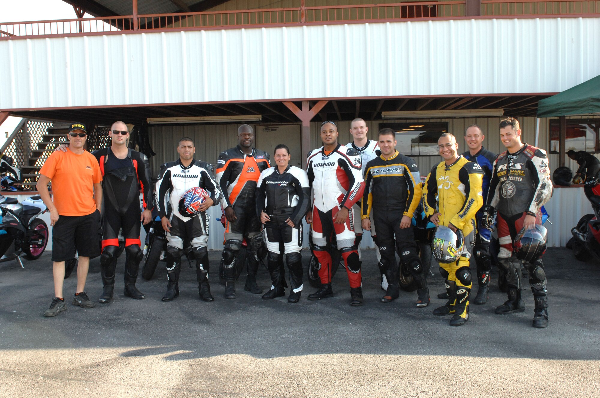 Airmen from the 317th Airlift Group don their personal protective equipment Aug. 22, 2011 at Eagles Canon Raceway, Decatur, Texas, prior to completing the proposed Advanced Motorcycle Riding Training Program. The purpose of the course is to teach a new skill-set that applies to how riders spend the majority of their time, at highway speed, building one’s skill level in motorcycle riding. (U.S. Air Force photo by 2nd Lt. AnnMarie Annicelli/Released) 