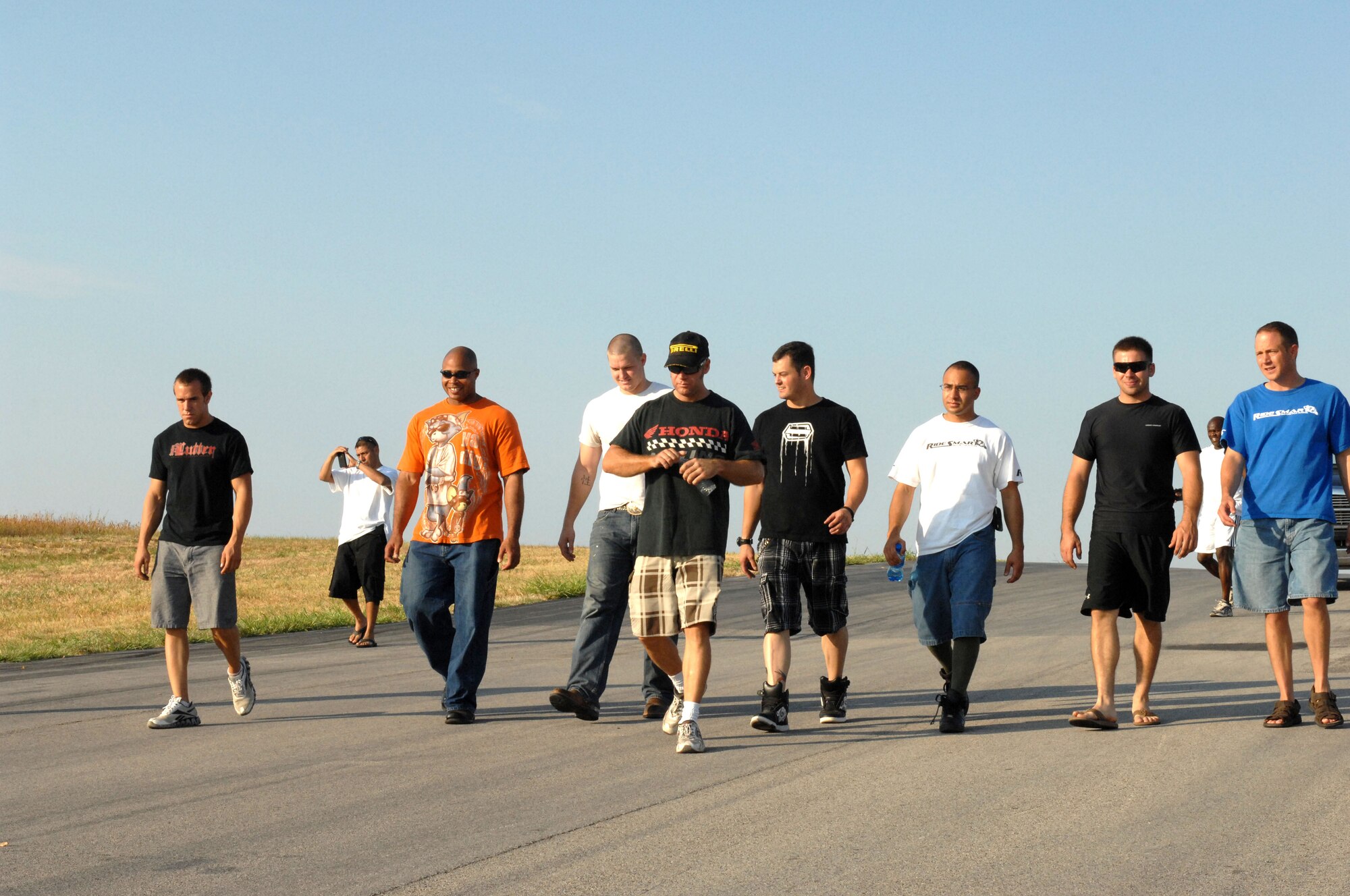 Airmen from the 317th Airlift Group inspect the racetrack Aug. 22, 2011 at Eagles Canon Raceway, Decatur, Texas, prior to completing the proposed Advanced Motorcycle Riding Training Program. The purpose of the course is to teach a new skill-set that applies to how riders spend the majority of their time, at highway speed, building one’s skill level in motorcycle riding. (U.S. Air Force photo by 2nd Lt. AnnMarie Annicelli/Released) 