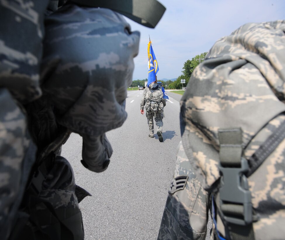 Langley Air Force Base Airmen participate in the Security Forces 9/11 Ruck March to Remember near Amherst, Va., Aug. 25, 2011.  They marched in remembrance of the 10th anniversary of  9/11 and the defenders who have fallen by enemy hands since the start of Operation Enduring Freedom. (U.S. Air Force photo by Tech. Sgt. Barry Loo/Released)