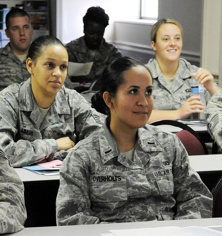 Members of Team Barksdale participate in a personal readiness briefing Aug. 30 at the Airman and Family Readiness Center on Barksdale Air Force Base, La. The AFRC facilitates numerous seminars, workshops and meetings to keep Airmen and their families informed. (U.S. Air Force photo/Airman 1st Class Andrea F. Liechti) (RELEASED)