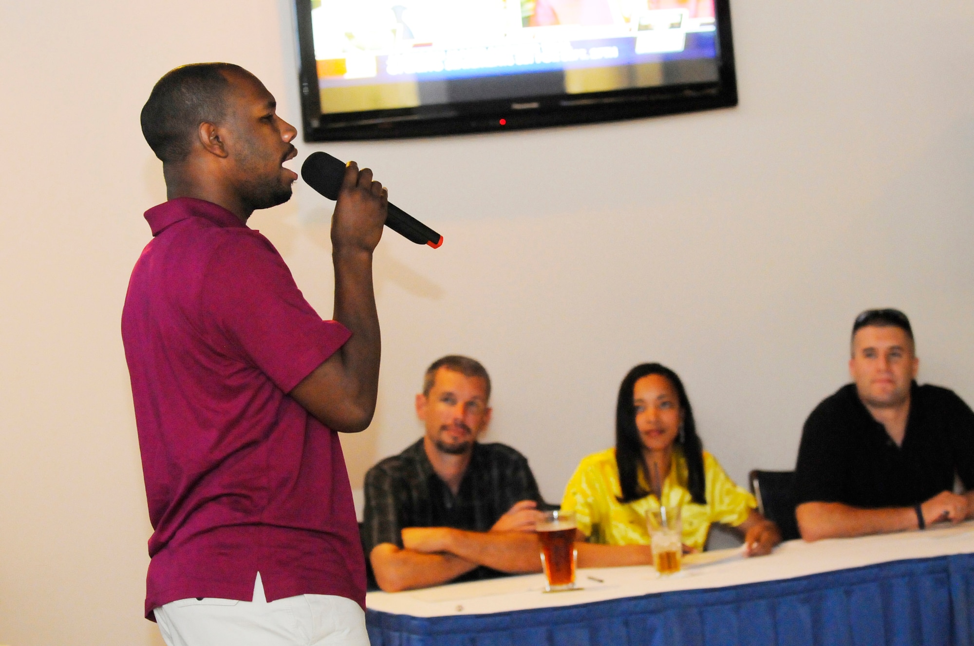 Johnathan Williams sings "I can't stop loving you". He placed 3rd in the Robins' Idol competition of Aug. 25. U. S. Air Force photo by Sue Sapp