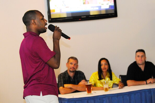 Johnathan Williams sings "I can't stop loving you". He placed 3rd in the Robins' Idol competition of Aug. 25. U. S. Air Force photo by Sue Sapp