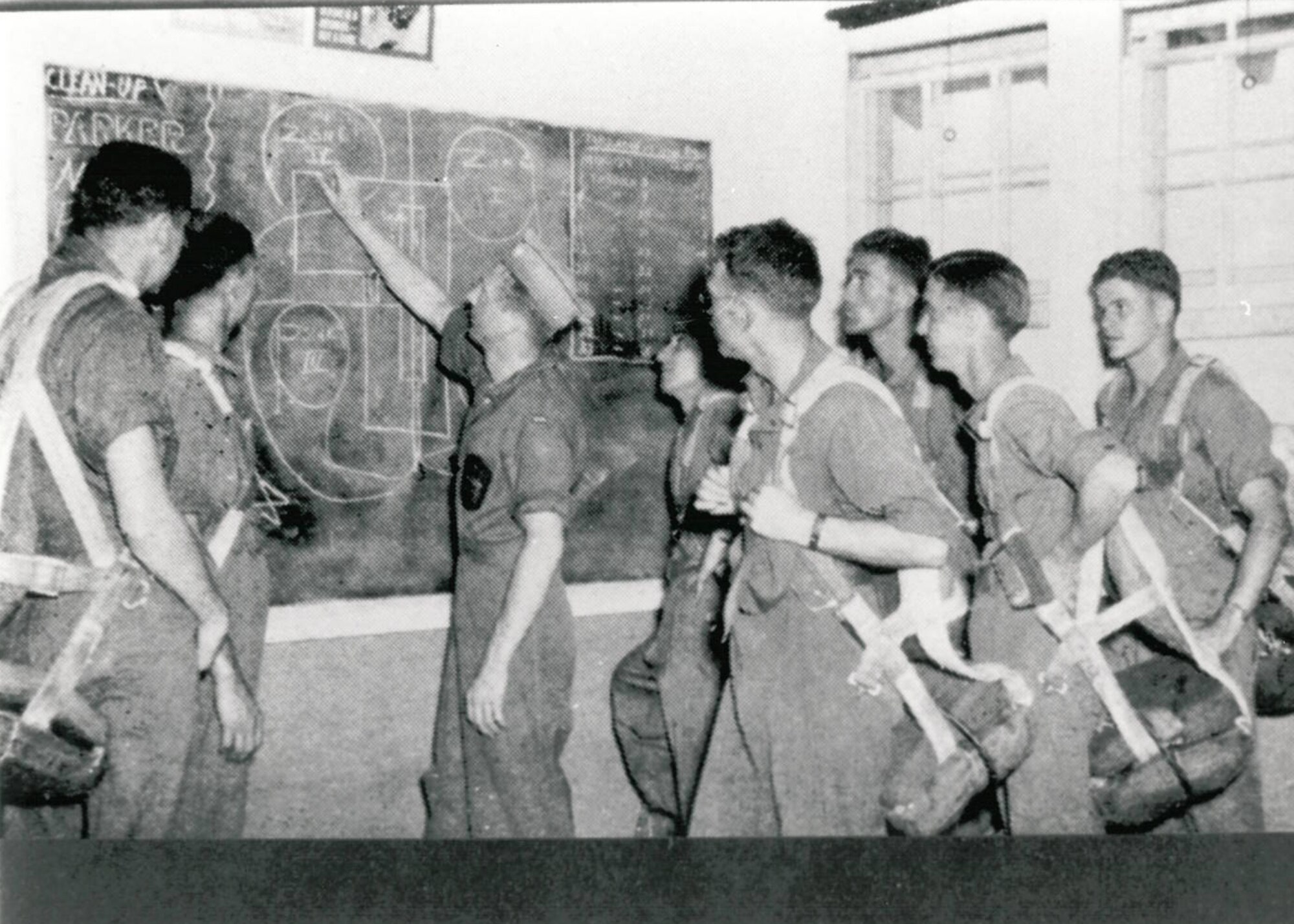 Cadet flight crews in 1942 during a pre-mission brief at the control tower(U.S. Air Force photo)