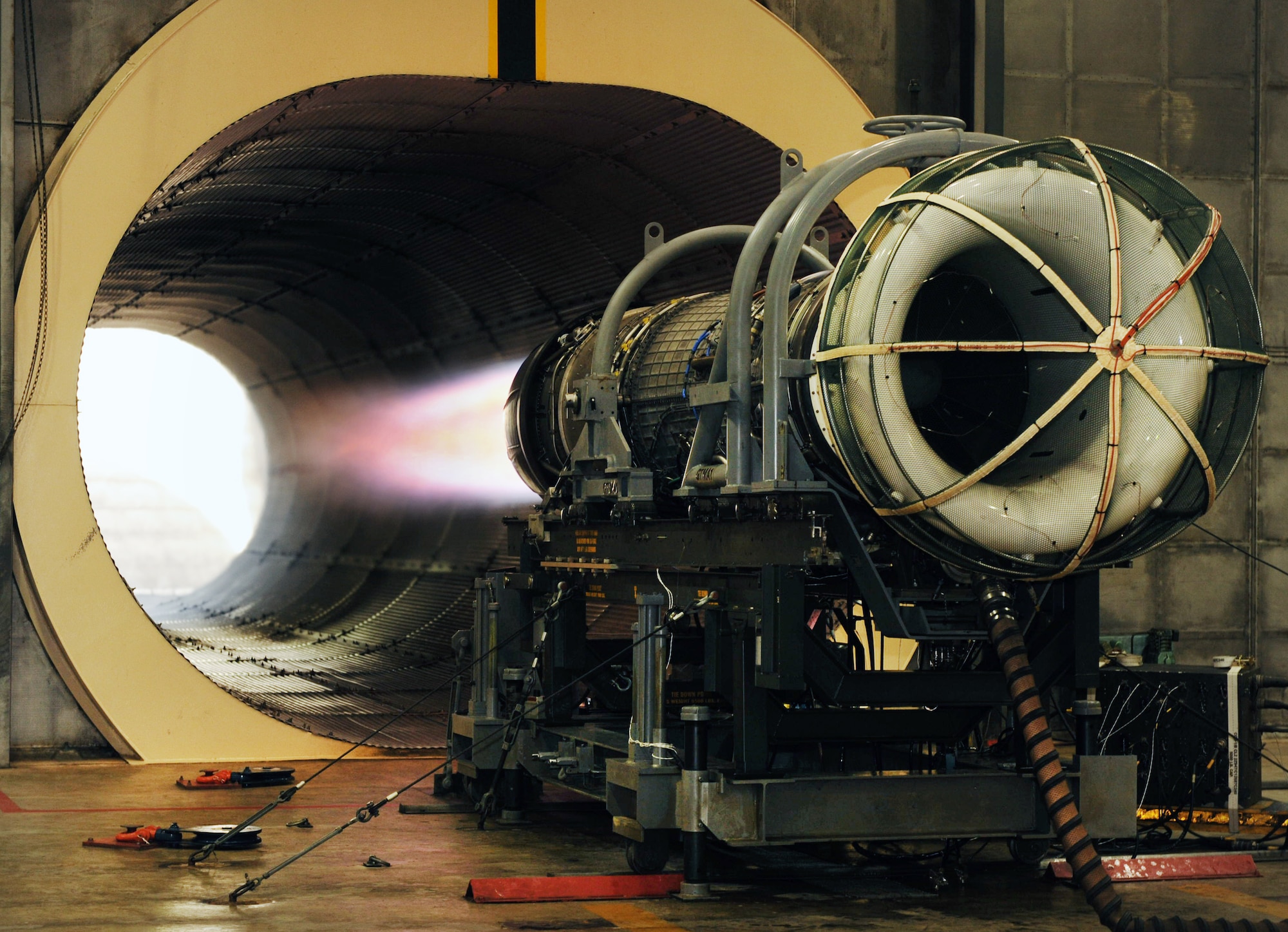 A F110-General Electric-129 F-16 Fighting Falcon engine being tested at Shaw Air Force Base, S.C. Aug. 26, 2011. The F110-General Electric-129 F-16 Fighting Falcon engine is tested at the hush house. The hush house is a term used for an enclosed, noise suppressed test facility for installed or uninstalled engines under a variety of engine operating conditions. (U.S. Air Force photo/Airman 1st Class Tabatha L. Duarte)(Released)