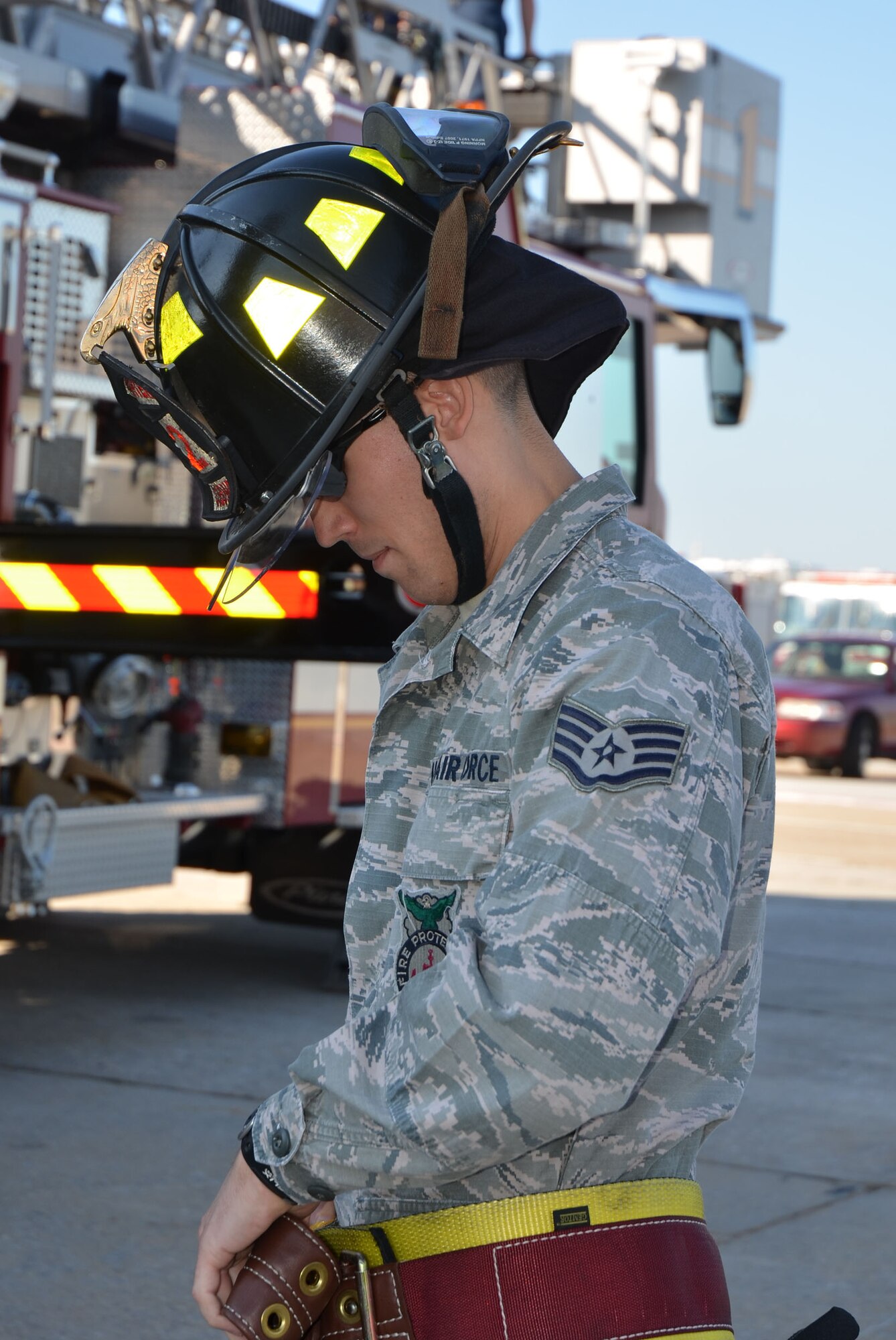 Staff Sgt. Xavier J. Jernigan with Dobbins Fire Department prepares for aerial ladder placement training at the new air traffic control tower here Aug 23. (U.S. Air Force Photo/Don Peek)