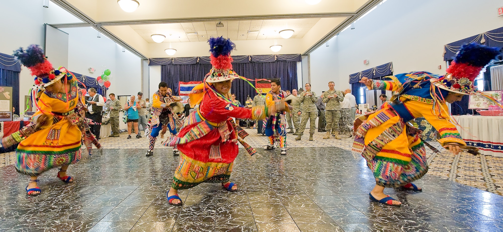 Members of Tinkus San Simon perform a tradition Bolivian dance during the multi-cultural expo Aug. 26, 2011, at The Landings Club at Dover Air Force Base, Del. The multi-cultural expo was held to celebrate Team Dover’s diversity. (U.S. Air Force photo by Airman 1st Class Samuel Taylor)