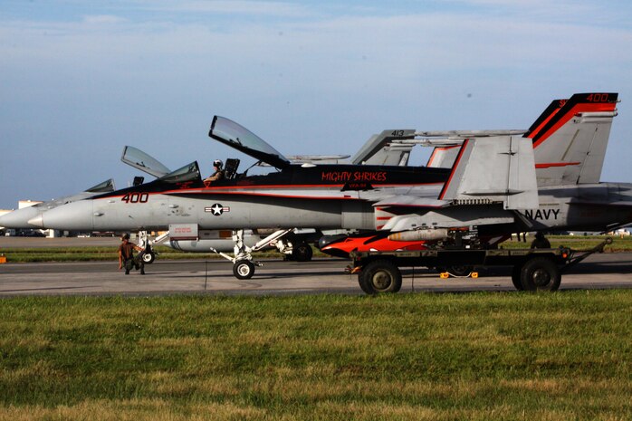 A Strike Fighter Squadron 94 F-18 Hornet prepares to take off to train on the flightline here during exercise Habu Fire II Aug. 31. Habu Fire II was a joint-training exercise where squadrons worked together to perform and improve efficiency in air-to-air operations.