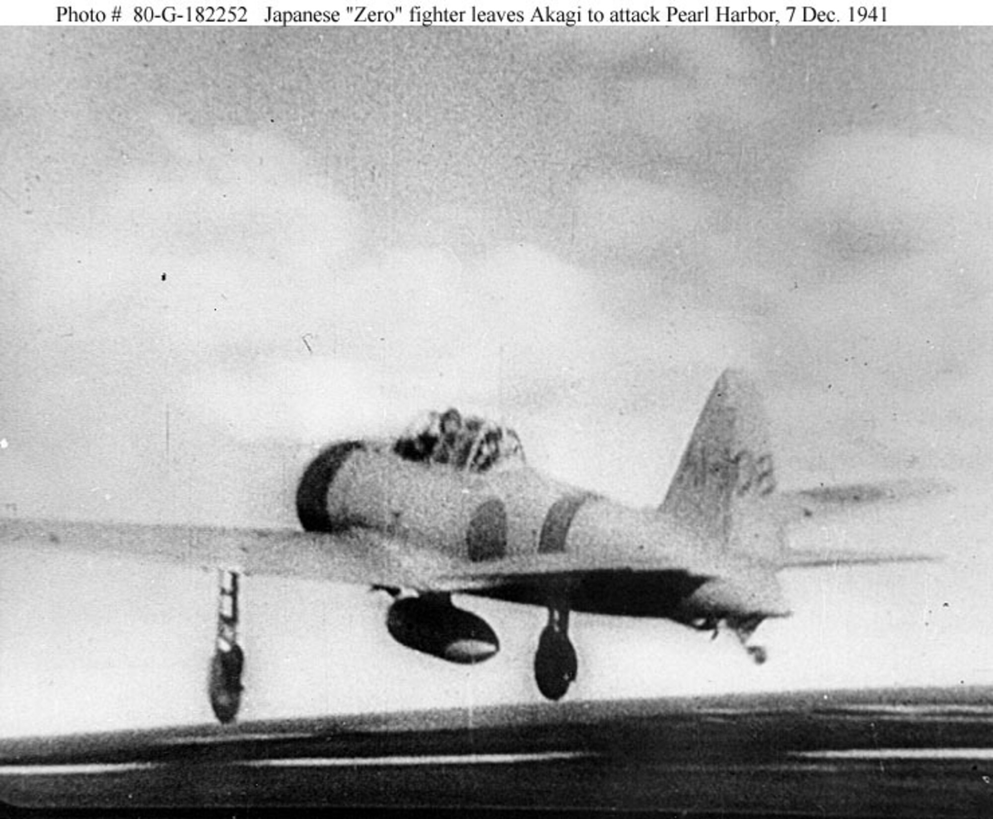 Photo # 80-G-182252 Japenese "Zero" fighter leaves Akagi to attack Pearl Harbor, 7 Dec. 1941