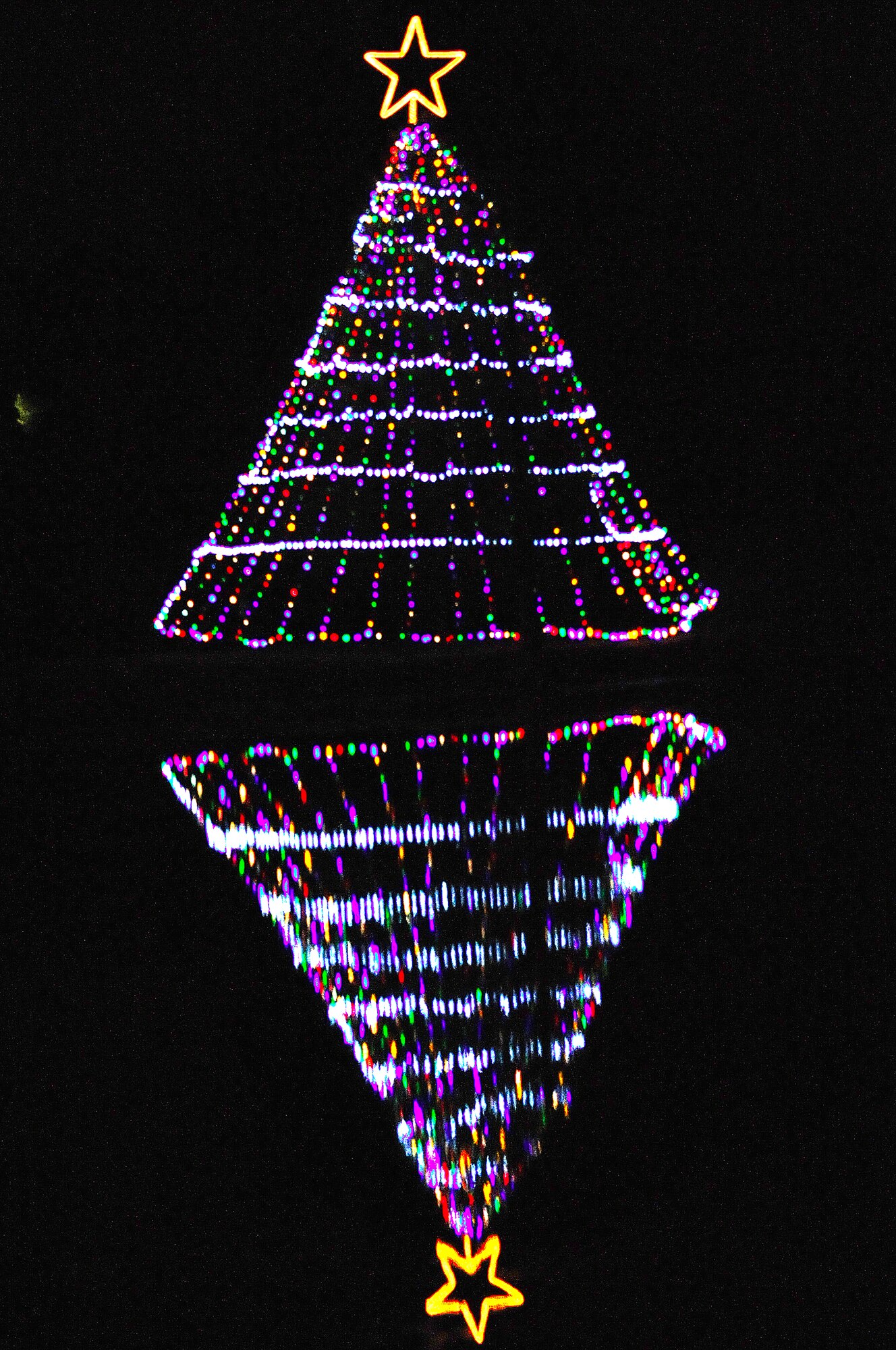 The Shaw Air Force Base Christmas tree brightens up the night at the end of the Christmas Tree Lighting Ceremony, Shaw Air Force Base, S.C., Nov. 30, 2011. The Christmas Tree Lighting Ceremony was put together by Shaw's Chaplains, and is held annually to signify the beginning of Christmas holiday activities. (U.S. Air Force photo by Airman First Class Hunter Brady/Released)








