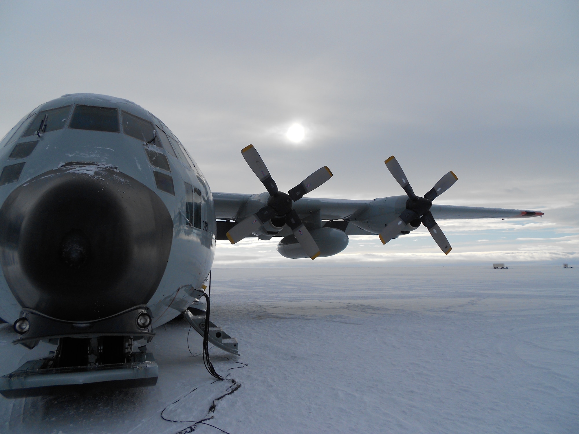 McMURDO STATION, Antarctica--An LC-130 Skibird waits on the ice at McMurdo Station, Antarctica November 21 after returning from a scheduled Operation Deep Freeze re-supply mission to Amundsen-Scott South Pole Station. Operation Deep Freeze provides airlift support to the National Science Foundation, which manages the United States Antarctic Program.