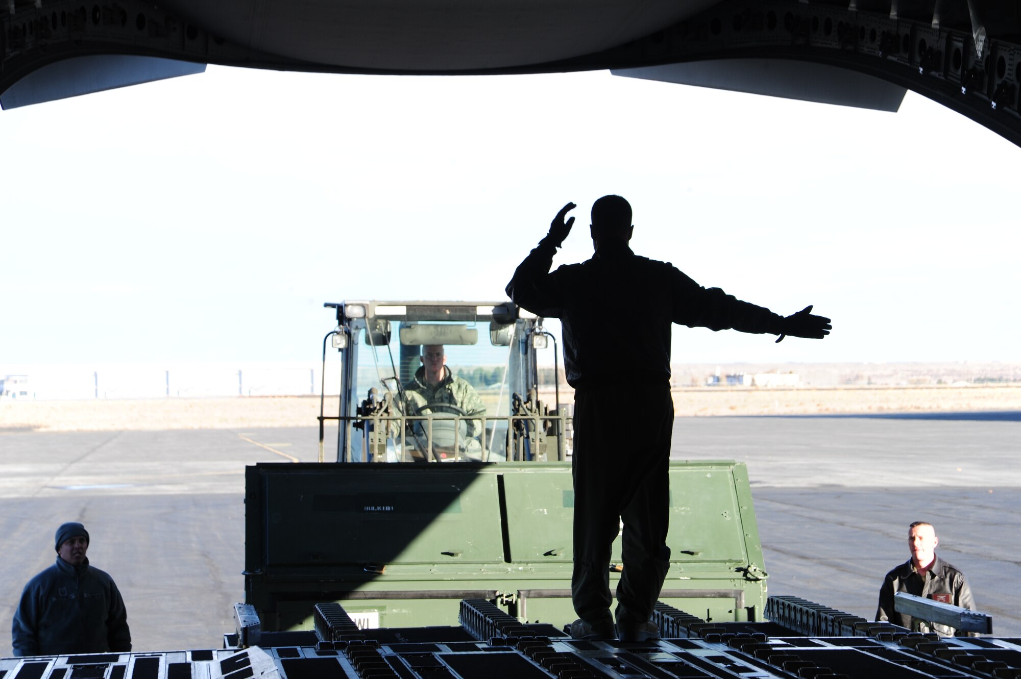 Members of the 92nd Logistics Readiness Squadron load the last equipment at the Grant County International Airport in Moses Lake, Wash. on a C-17 Globemaster Nov. 17. The equipment was returned to Fairchild because of the completion of the new runway and their resumption of flight operations. (U.S. Air Force photo/Airman 1st Class Taylor Curry