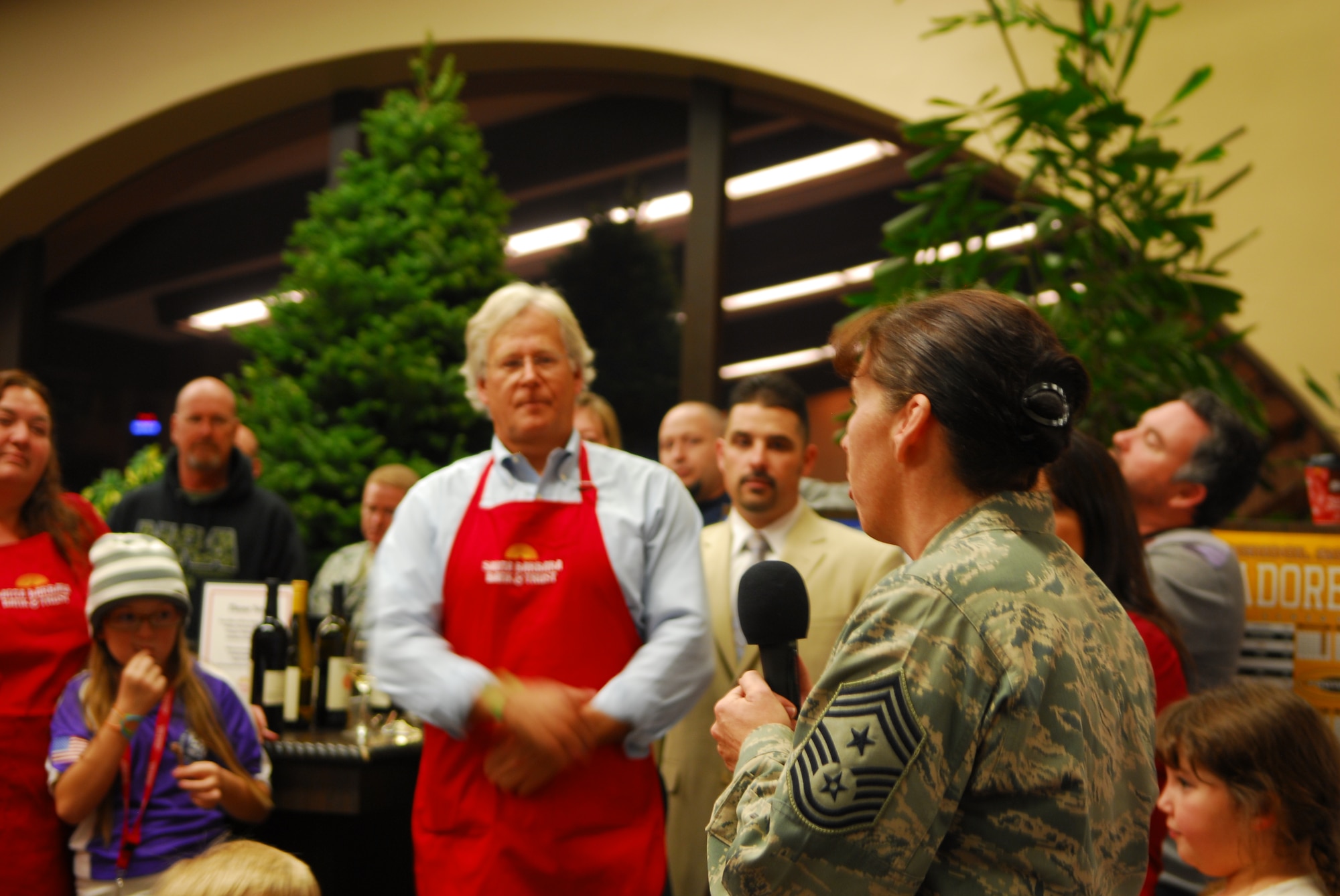VANDENBERG AIR FORCE BASE, Calif. – Saying a few words of appreciation, Chief Master Sgt. Suzanne Talbert, 30th Space Wing command chief, speaks to a crowd of people at the Santa Barbara Bank and Trust in Lompoc during a ceremony in which holiday trees were donated to Vandenberg Airmen Wednesday, Nov. 30, 2011. Donations by the local community contributed to the Trees for Troops program which provides holiday trees to active U.S. military families around the world. (U.S. Air Force photo/Senior Airman Steve Bauer) 