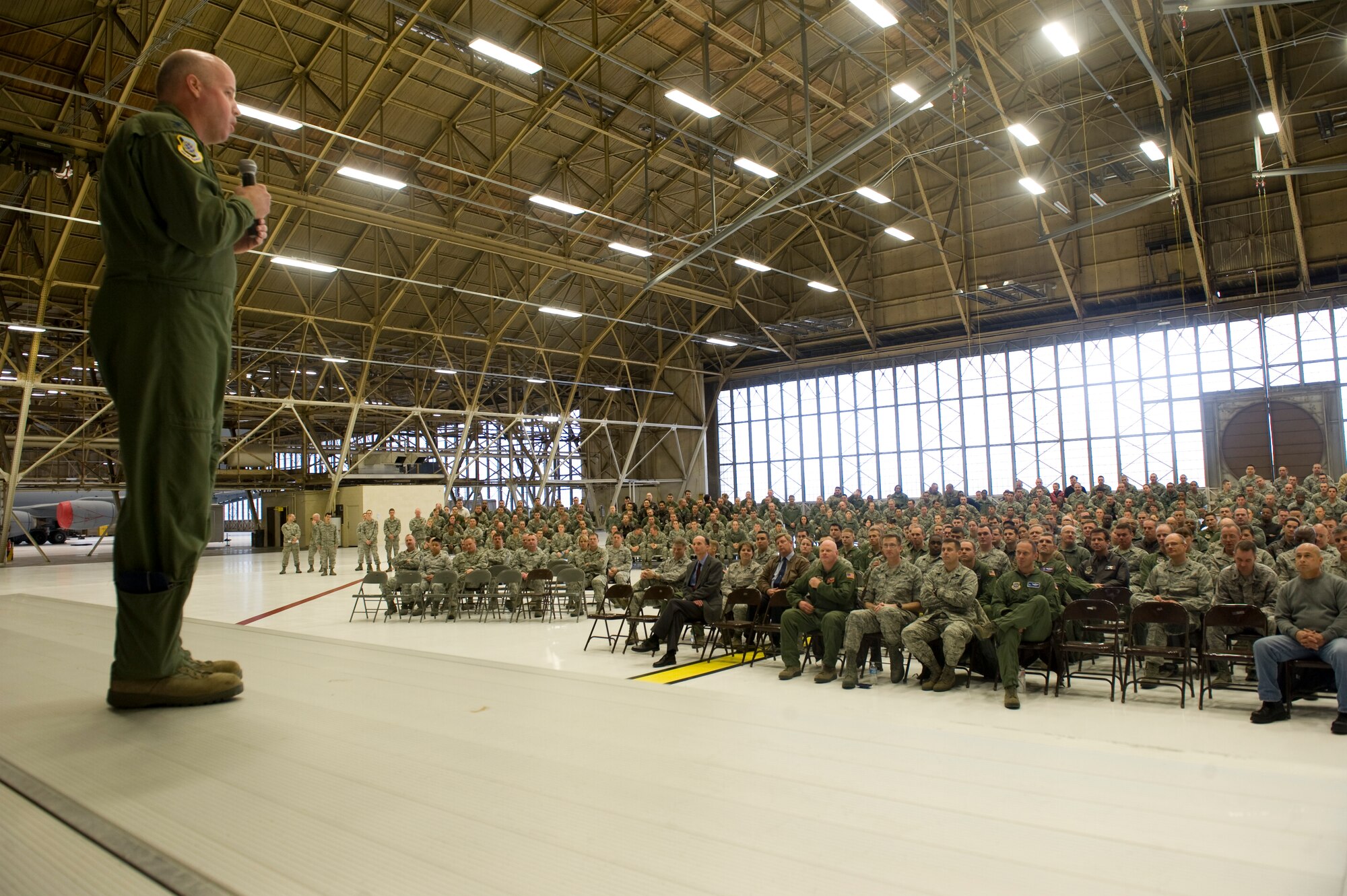 Col. Paul Guemmer, 92nd Air Refueling Wing commander congratulates the wing on a successful transition back from Grant County International and Spokane International Airports. The event was a formal “welcome home” to the troops and aircraft after a $43.6 million runway reconstruction.  In that timeframe, Fairchild completed 1,125 successful missions with 600 sorties flown throughout the world supporting Operations New Dawn, Enduring Freedom, Odyssey Dawn, Unified Endeavor, and Red Flag Alaska.   (U.S. Air Force photo/Airman 1st Class Earlandez M. Young)