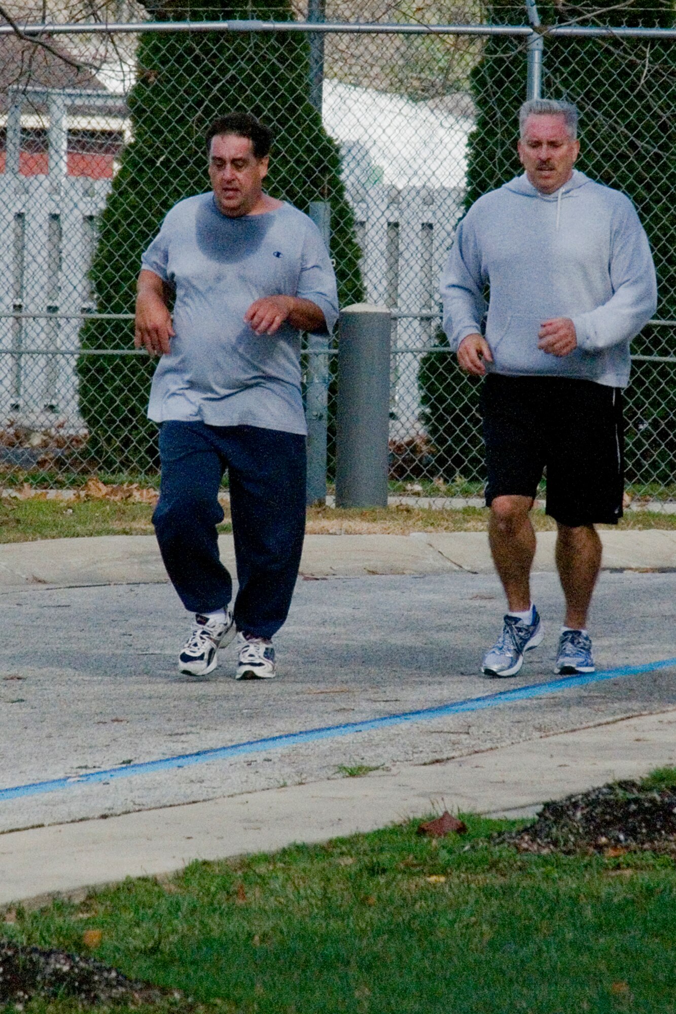 GRISSOM AIR RESERVE BASE, Ind. -- Paul Weimer, left, and Robert Sucharski head to the finish line during a 5-kilometer 'turkey trot' here Nov. 15.The runners predicted their finish time prior to the race, and those who completed closest to their time bagged a turkey for the holidays. It was Weimer, Sucharski and Chris Feltis who took home a bird. (U.S. Air Force photo/ Senior Airman Jami K. lancette)