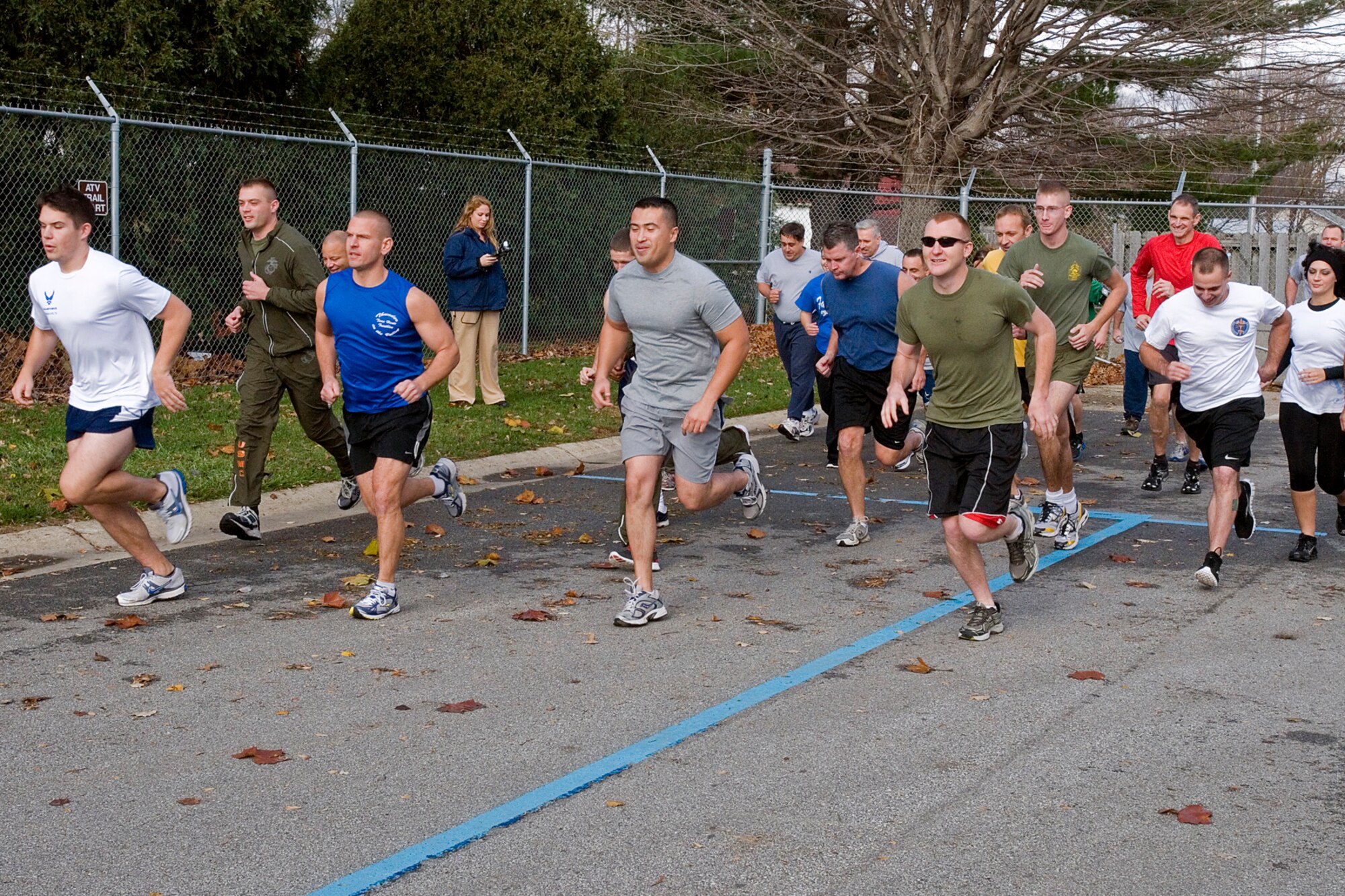 GRISSOM AIR RESERVE BASE, Ind. -- Grissom personnel take off from the starting line for a 5-kilometer 'turkey trot' here Nov. 15. The runners predicted their finish time prior to the race, and those who completed closest to their time bagged a turkey for the holidays. It was Paul Weimer, Robert Sucharski and Chris Feltis who took home a bird. (U.S. Air Force photo/ Senior Airman Jami K. lancette)