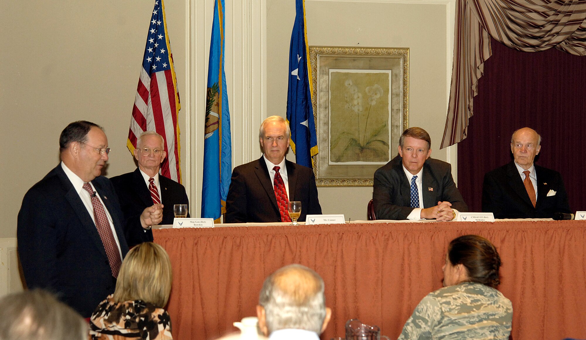 Former Tinker leaders discuss their experiences and share thoughts on the current Air Force as they take questions during a Nov. 17 combined Logistics Officer Association and Air Force Association luncheon at the Tinker Club. Moderating the panel was retired Brig. Gen. Ben Robinson, 552nd Air Control Wing commander from 2000-2002. Seated from left are; retired Maj. Gen. William Bowden, Oklahoma City Air Logistics Center commander from 1985-1989; Robert Conner, OC-ALC director from 2005-2007; retired Chief Master Sgt. of the Air Force Rodney McKinley (2006-2009), who also served in numerous positions at Tinker; and retired Maj. Gen. Jay Edwards, OC-ALC commander from 1980-1982. (Air Force photo by Margo Wright)