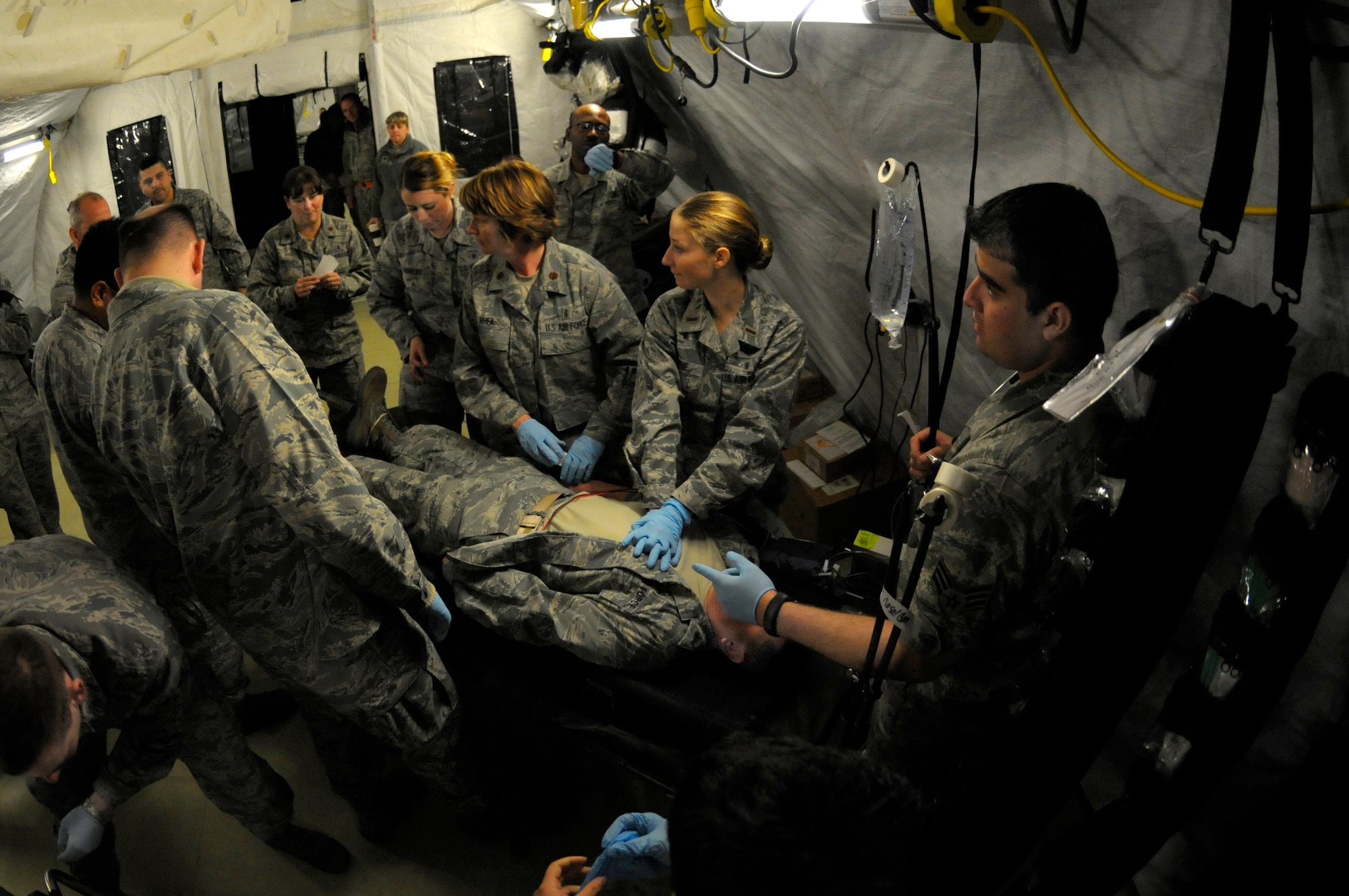 The 86th Medical Squadron Intensive Care Unit works to resuscitate a patient who is unresponsive in the Expeditionary Medical Support Exercise at Ramstein Air Base, Germany, Dec. 1, 2011. EMEDS was a week-long exercise for the 86th and 31st Medical Groups to hone their skills in a mock-deployed environment. (U.S. Air Force photo by Staff Sgt. Travis Edwards)