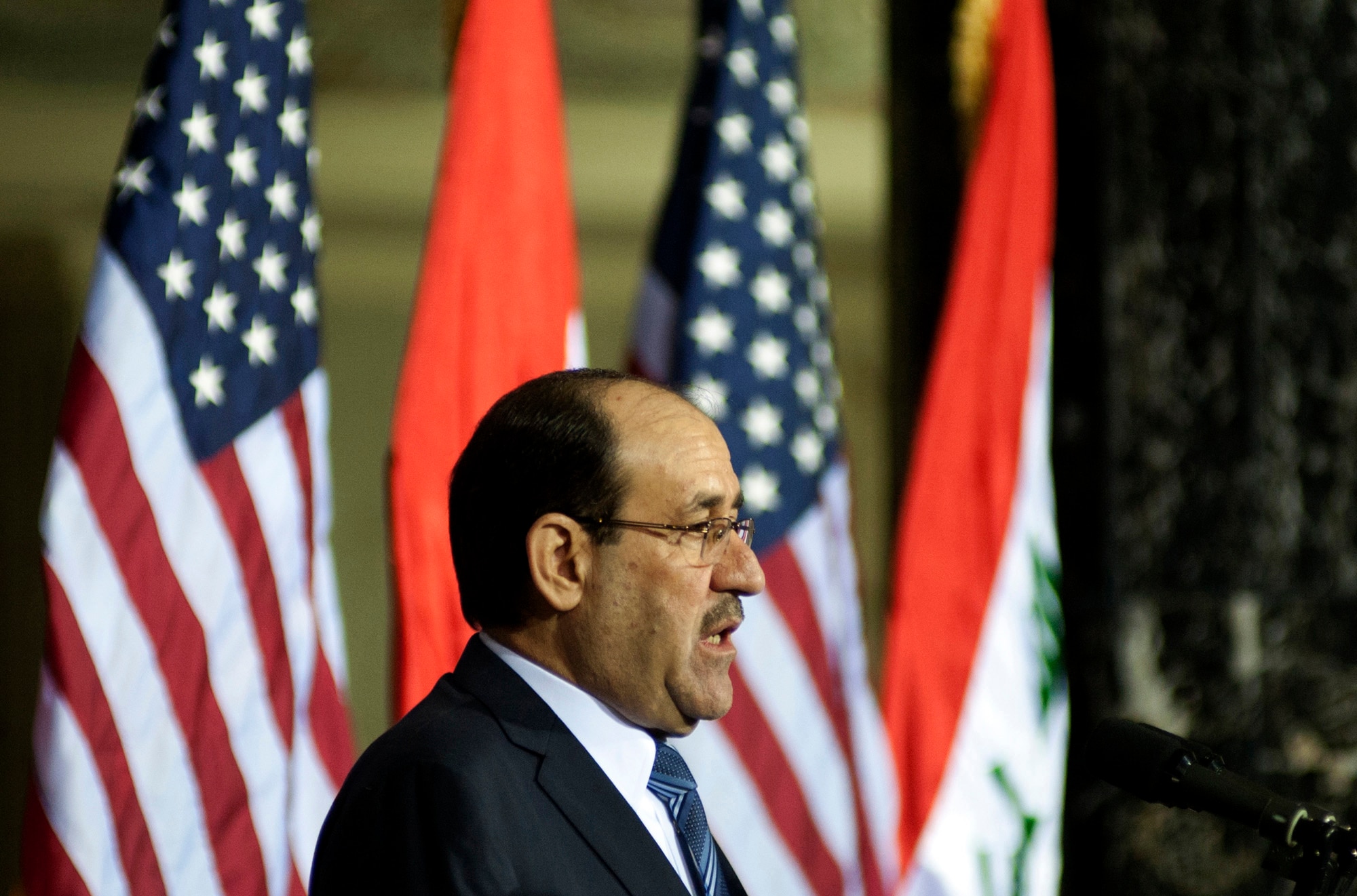 Iraqi Prime Minister, Nouri al-Maliki gives a speech during the Government of Iraq Day of Commitment Ceremony in the Al Faw Palace at Victory Base Complex, Iraq, Dec. 1, 2011. The ceremony commemorated the sacrifices and accomplishments of U.S. and Iraqi service members. (U.S. Air Force photo/Master Sgt. Cecilio Ricardo)