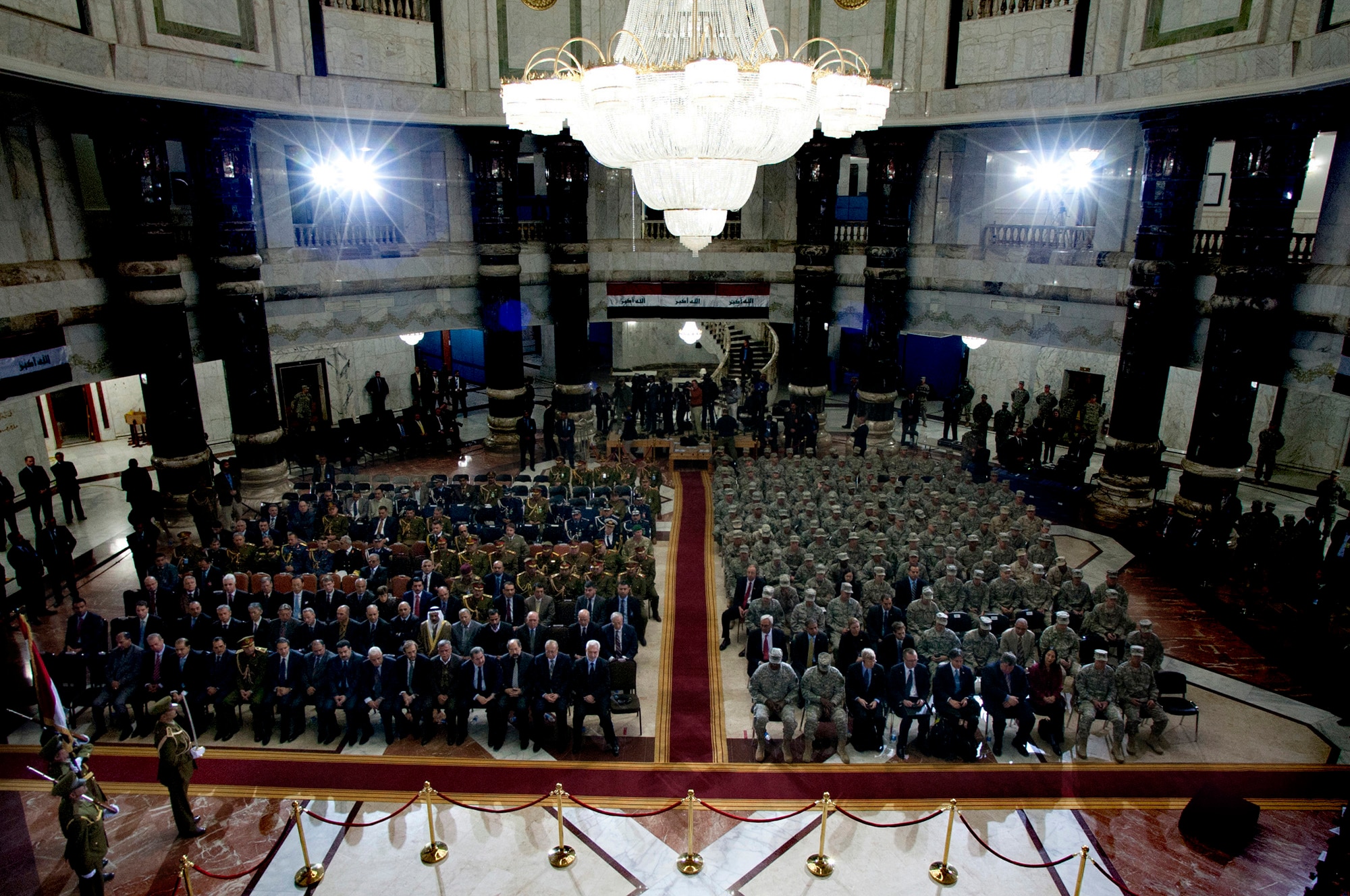Ambassador James F. Jeffrey, U.S. Vice President, Joe Biden, Iraqi President Jalal Talabani, Iraqi Prime Minister, Nouri al-Maliki along with U.S. and Iraqi service members and media attended the Government of Iraq Day of Commitment Ceremony in the Al Faw Palace at Victory Base Complex, Iraq, Dec. 1, 2011. The ceremony commemorated the sacrifices and accomplishments of U.S. and Iraqi service members. (U.S. Air Force photo/Master Sgt. Cecilio Ricardo)