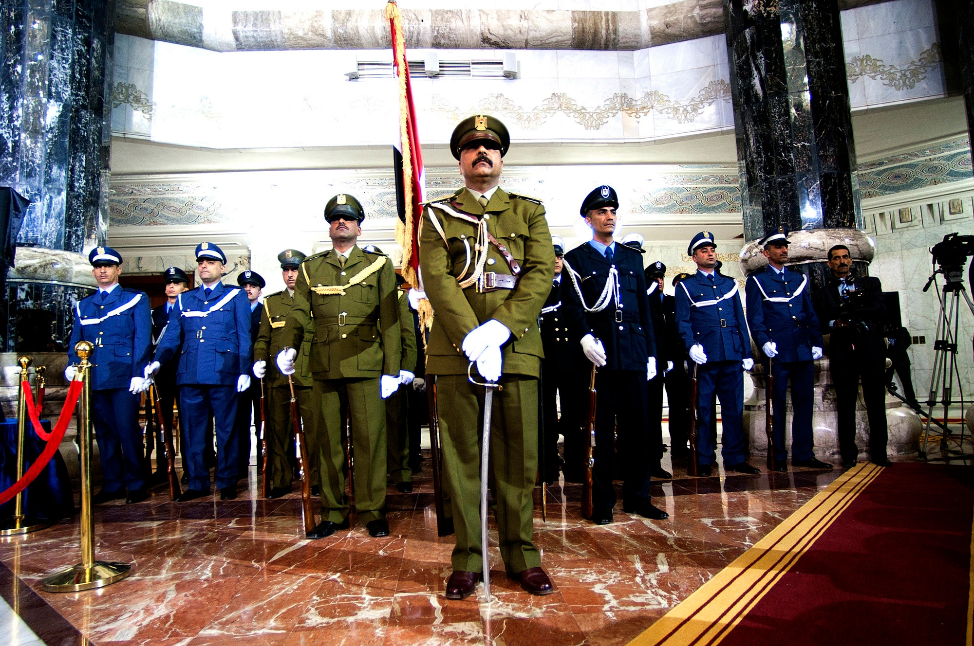 Iraqi military and police personnel stand in formation during the Government of Iraq Day of Commitment Ceremony at the Al Faw Palace on Victory Base Complex, Iraq, Dec. 1, 2011. The ceremony commemorated the sacrifices and accomplishments of U.S. and Iraqi service members. (U.S. Air Force photo/Master Sgt. Cecilio Ricardo)